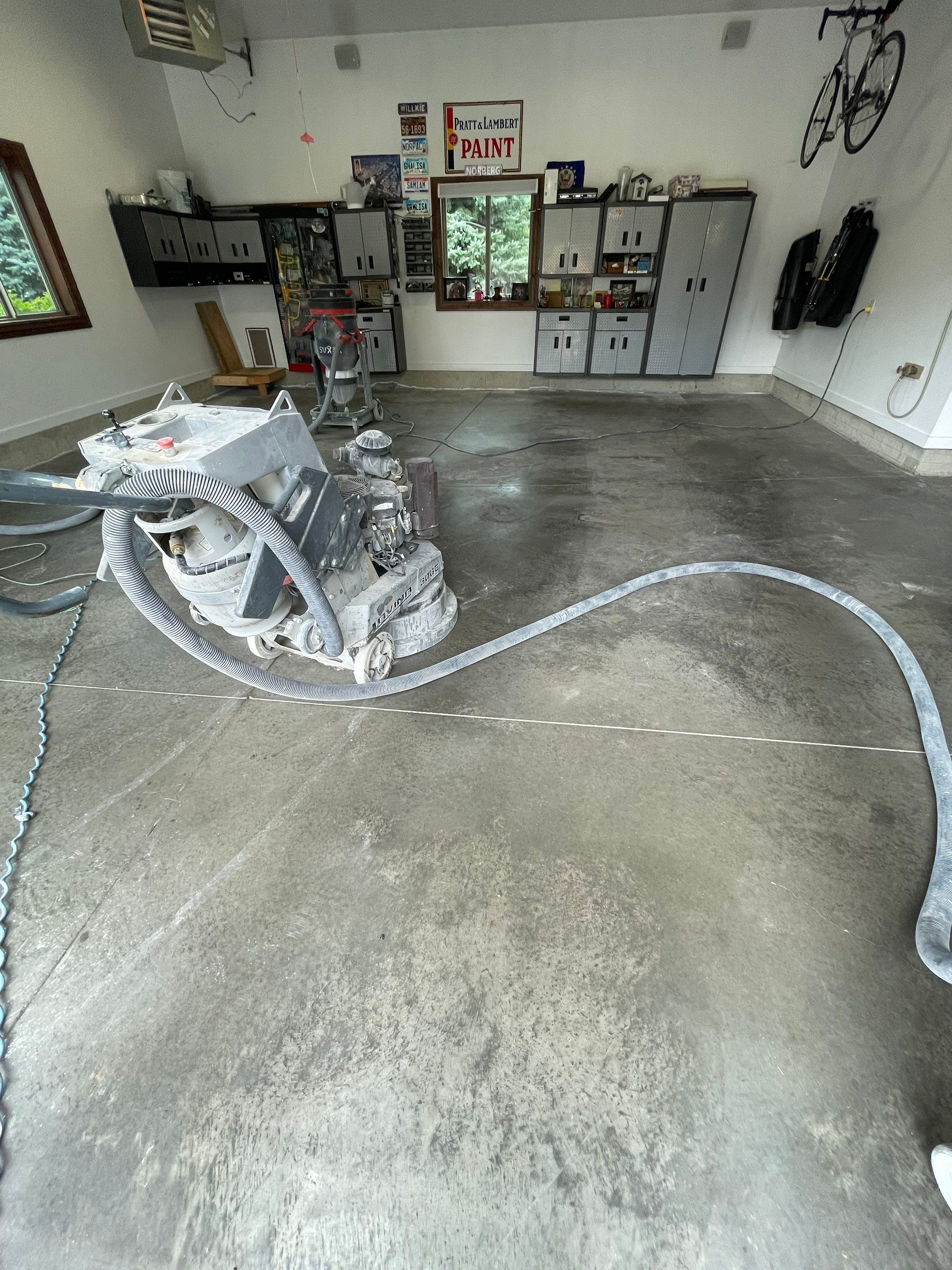 Garage Floor Coating and Domino Flake Finish in Sioux Falls by Select Painting, Coatings & Garage Cabinets