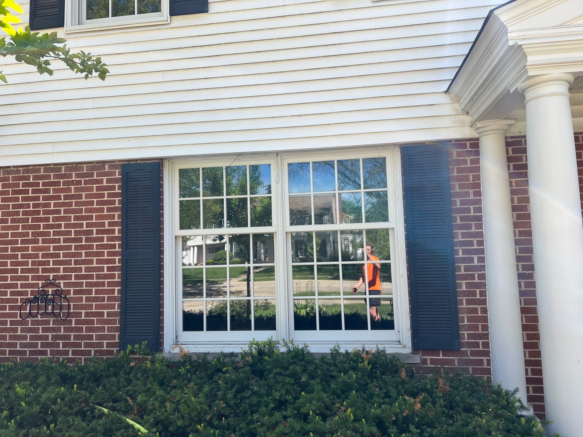 Housewashing  using Algaecide, soft wash soap by Northern Power Washing LLC.