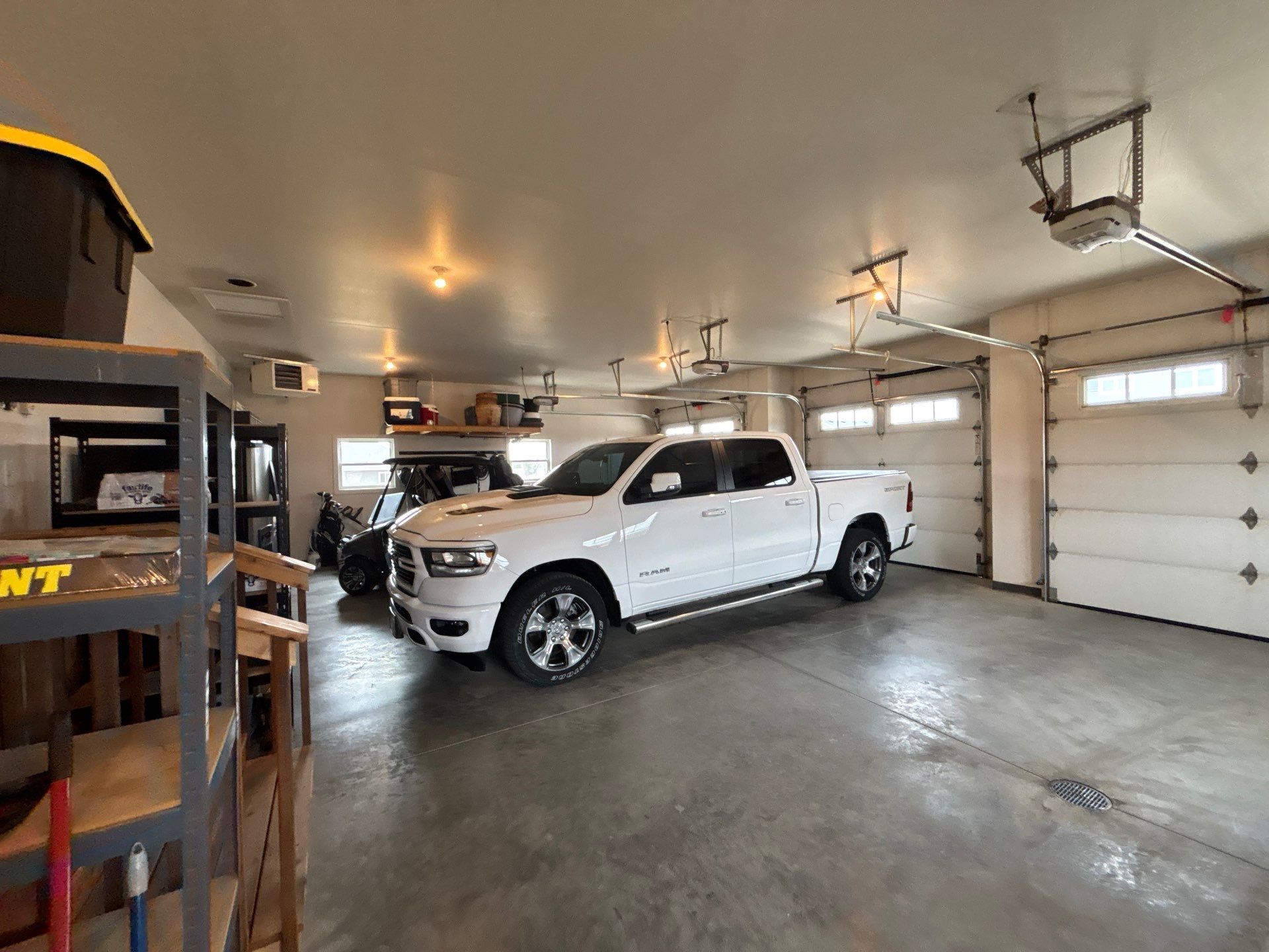 Multi-Car Garage Concrete Coating and Crack Repair in Dell Rapids by Select Painting, Coatings & Garage Cabinets