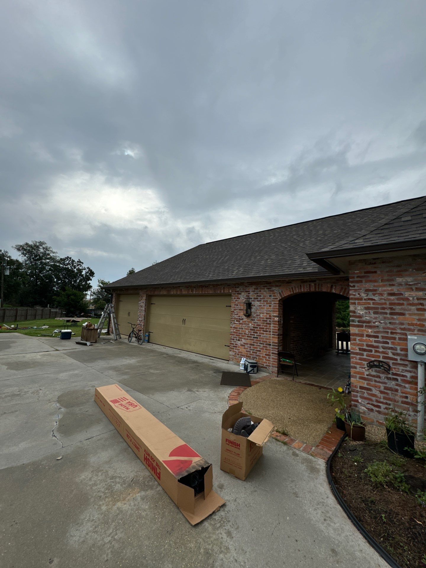 Residential Roofing Installation using Atlas Pinnacle Impact Weathered Wood; Weathered Bronze Gutters  by Top Team Construction