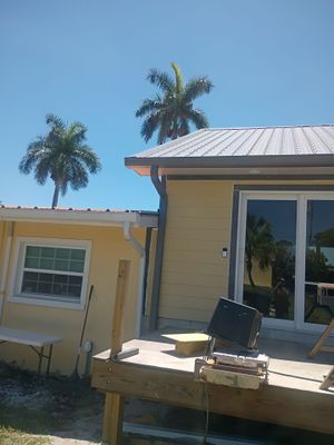 Musket Brown Seamless Gutters Installation in Saint James City, FL 
