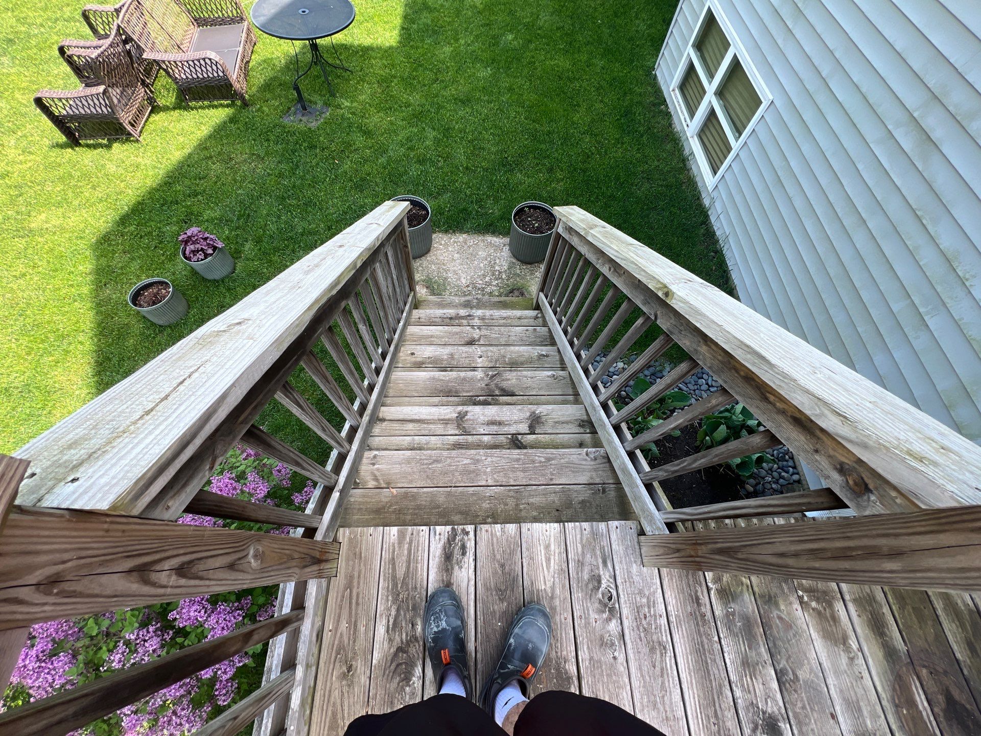 wood deck cleaning and staining by Northern Power Washing LLC.
