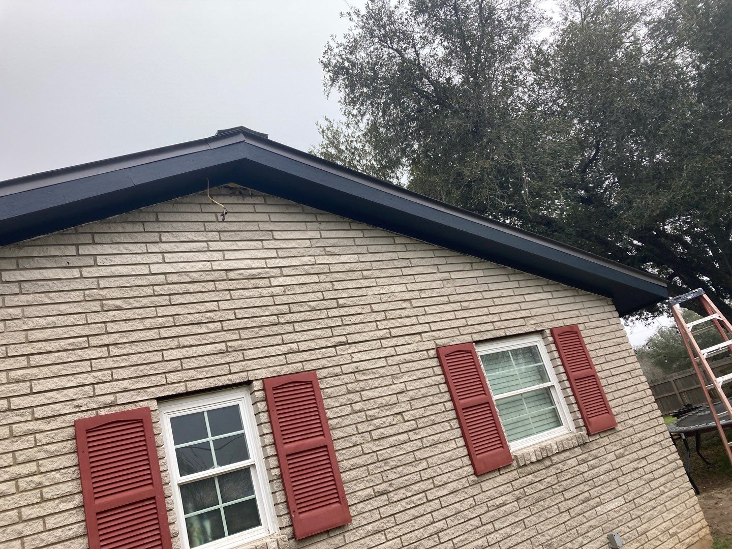 Beeville Backporch sittin' by Bayfront Roofing and Construction