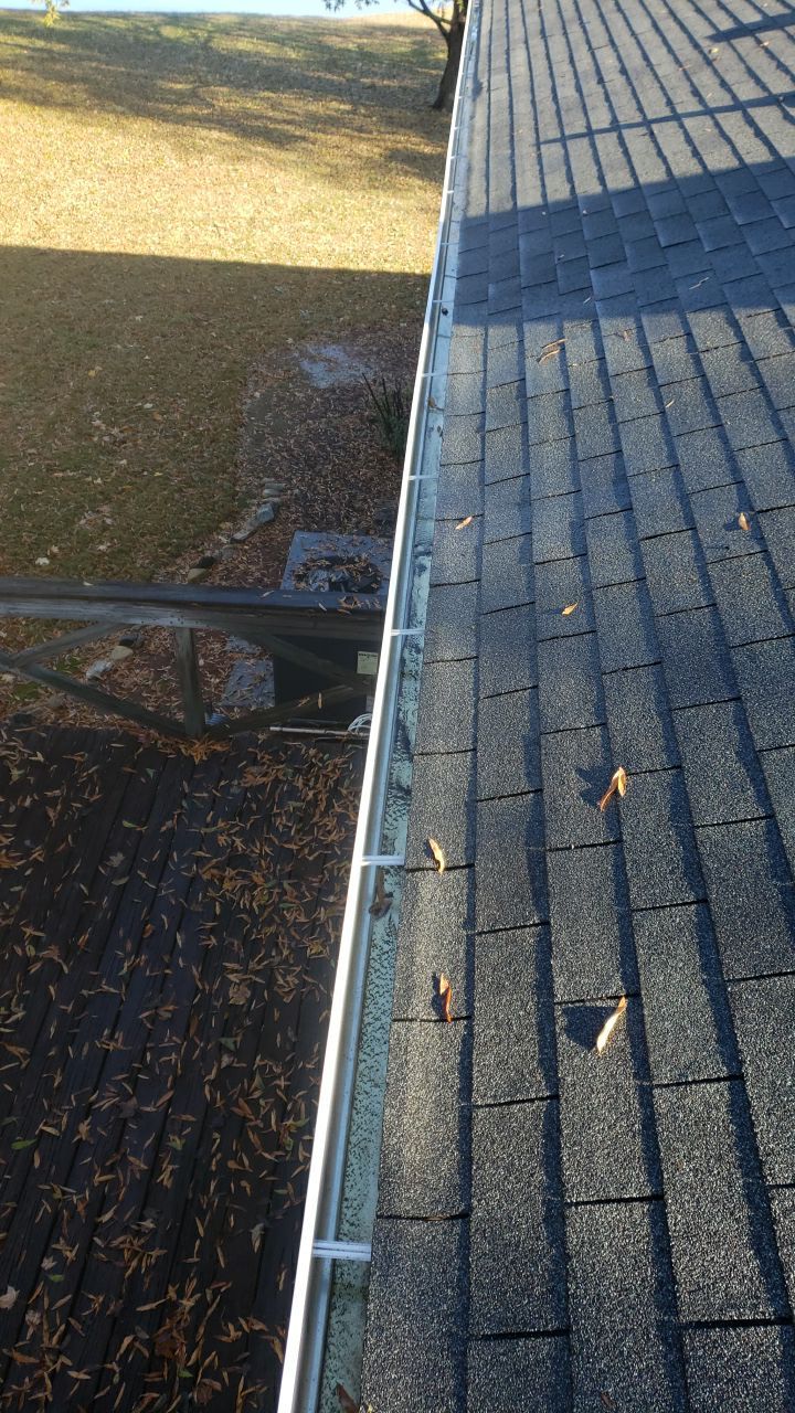 gutter cleaning and house wash and gutter guard installation by Power Wash Masters LLC