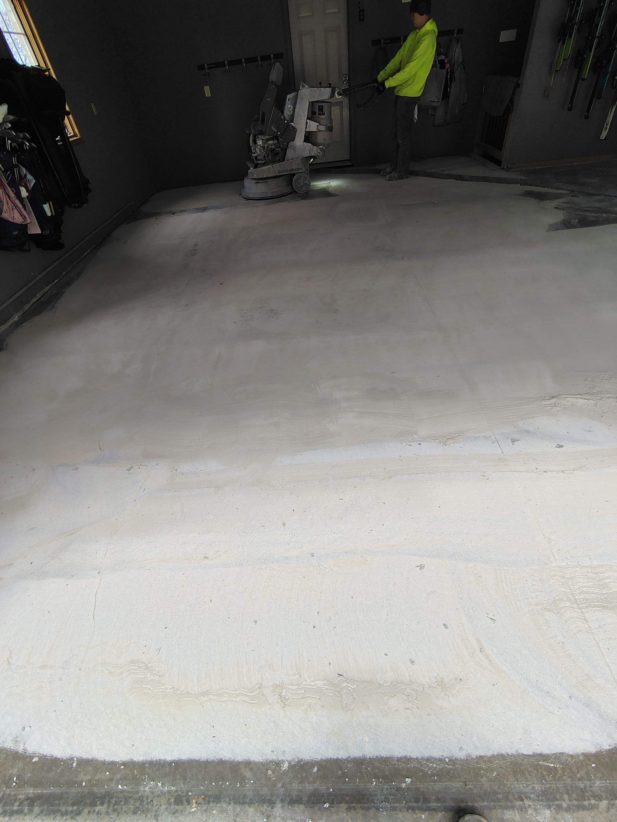 Garage Floor Concrete Coating and Crack Repair in Sioux Falls by Select Painting, Coatings & Garage Cabinets