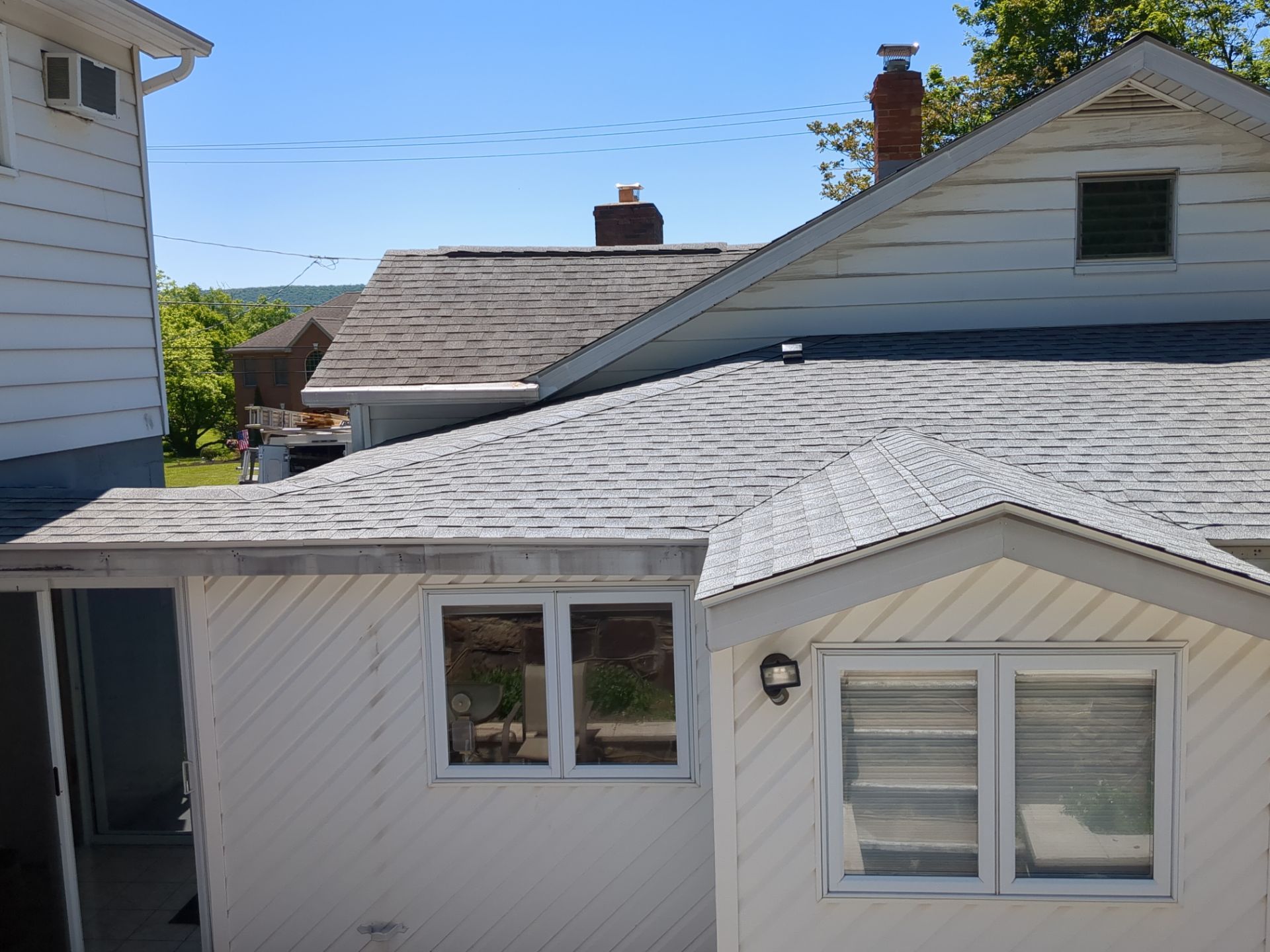 Shingle Roof Replacement and Seamless Gutter Installation in Lavelle by Esh Builders
