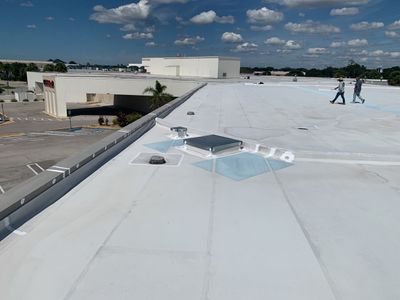 Silicone Roof Coating and Parapet Wall Repairs in South Bradenton
