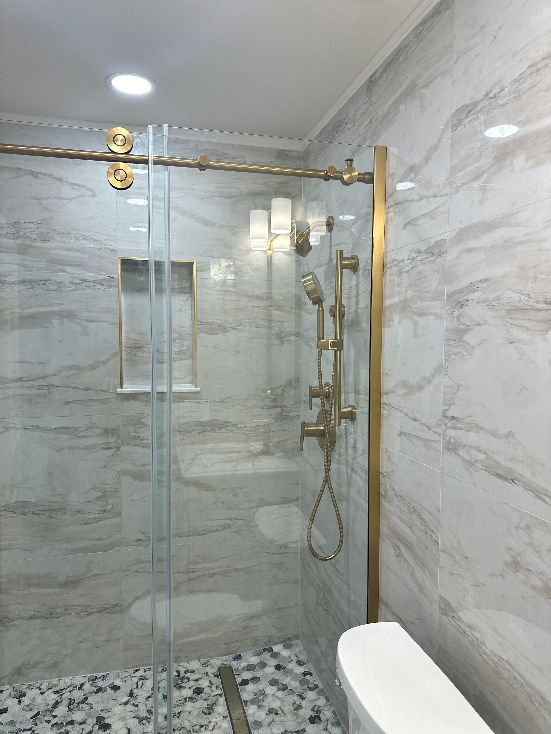 Bathroom Remodel using Tile by Home Concepts Construction