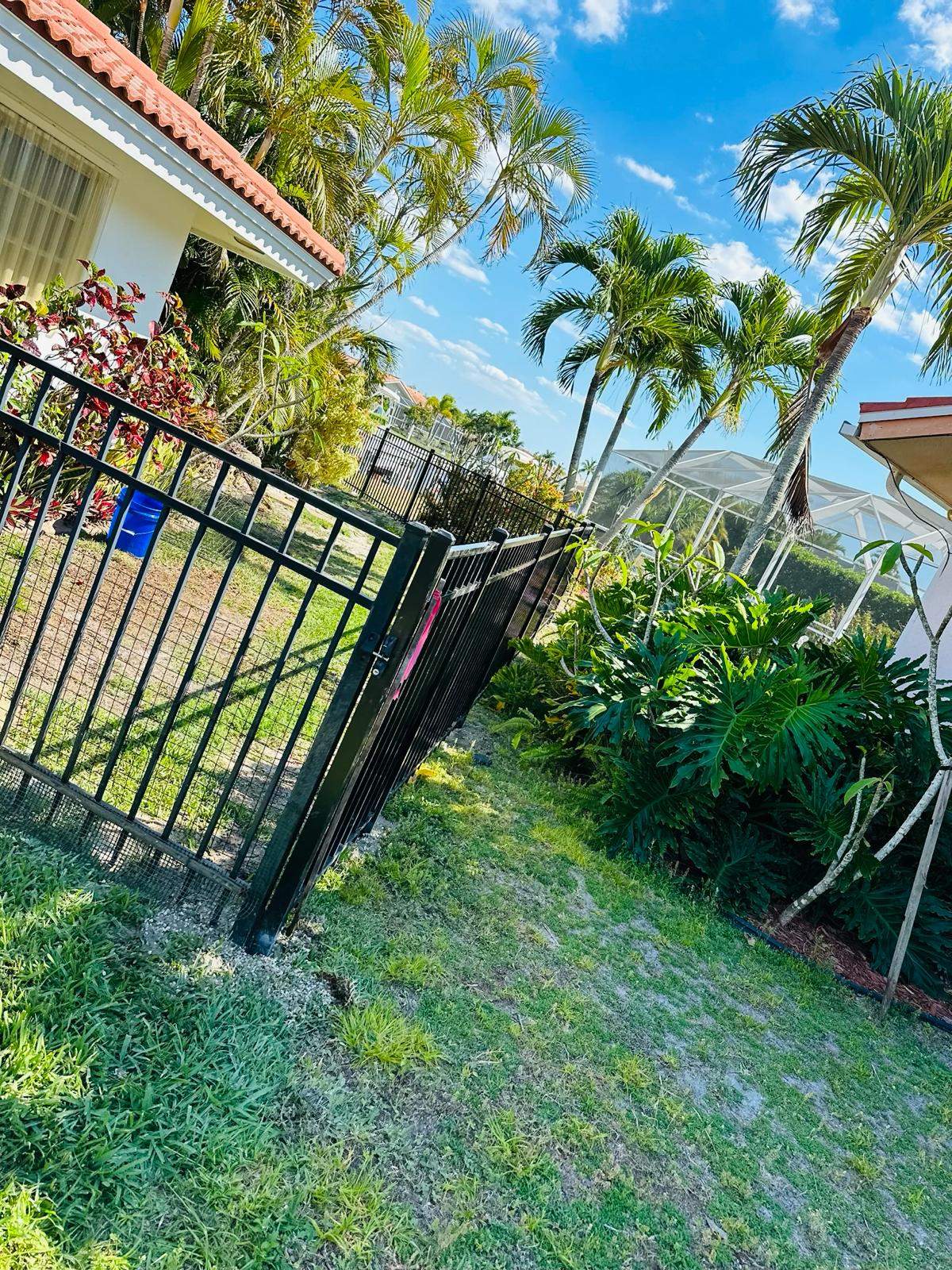 Waterfront Aluminum Picket Fence Installation in Punta Gorda by True Fence LLC