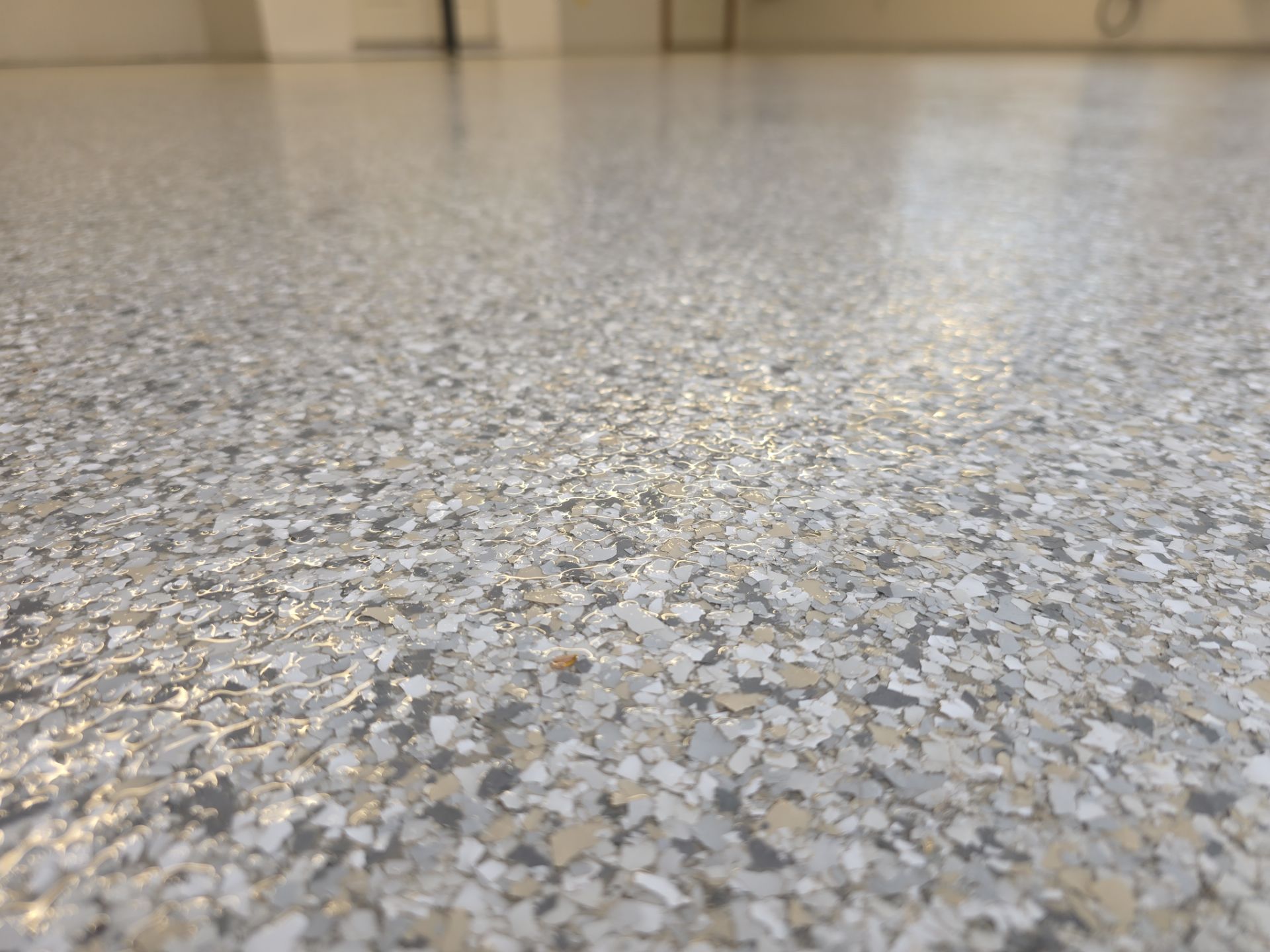 Hayden Garage Floor Transformation with Mt. Everest Flake Finish by Croc Coatings, LLC