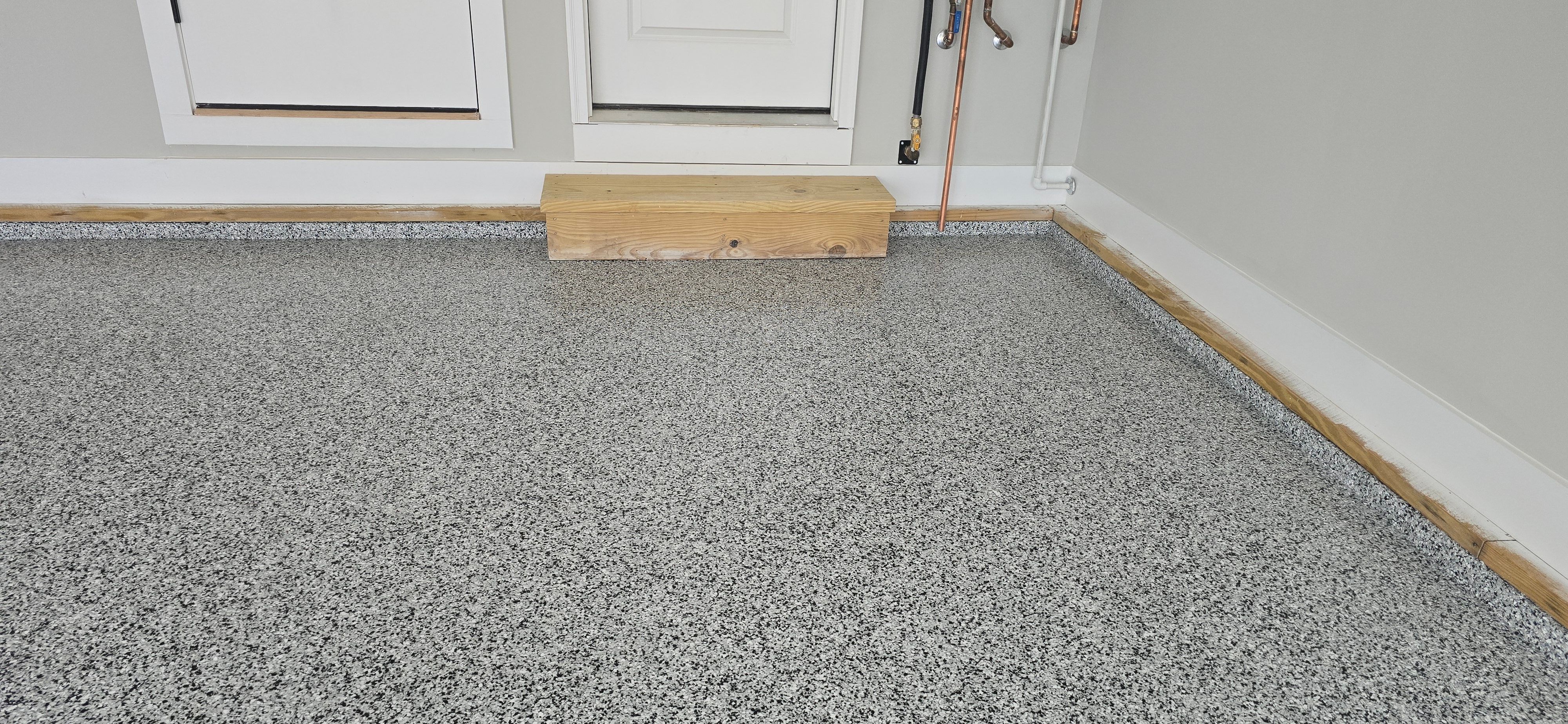Garage using Houndstooth by Elite Floor Solutions