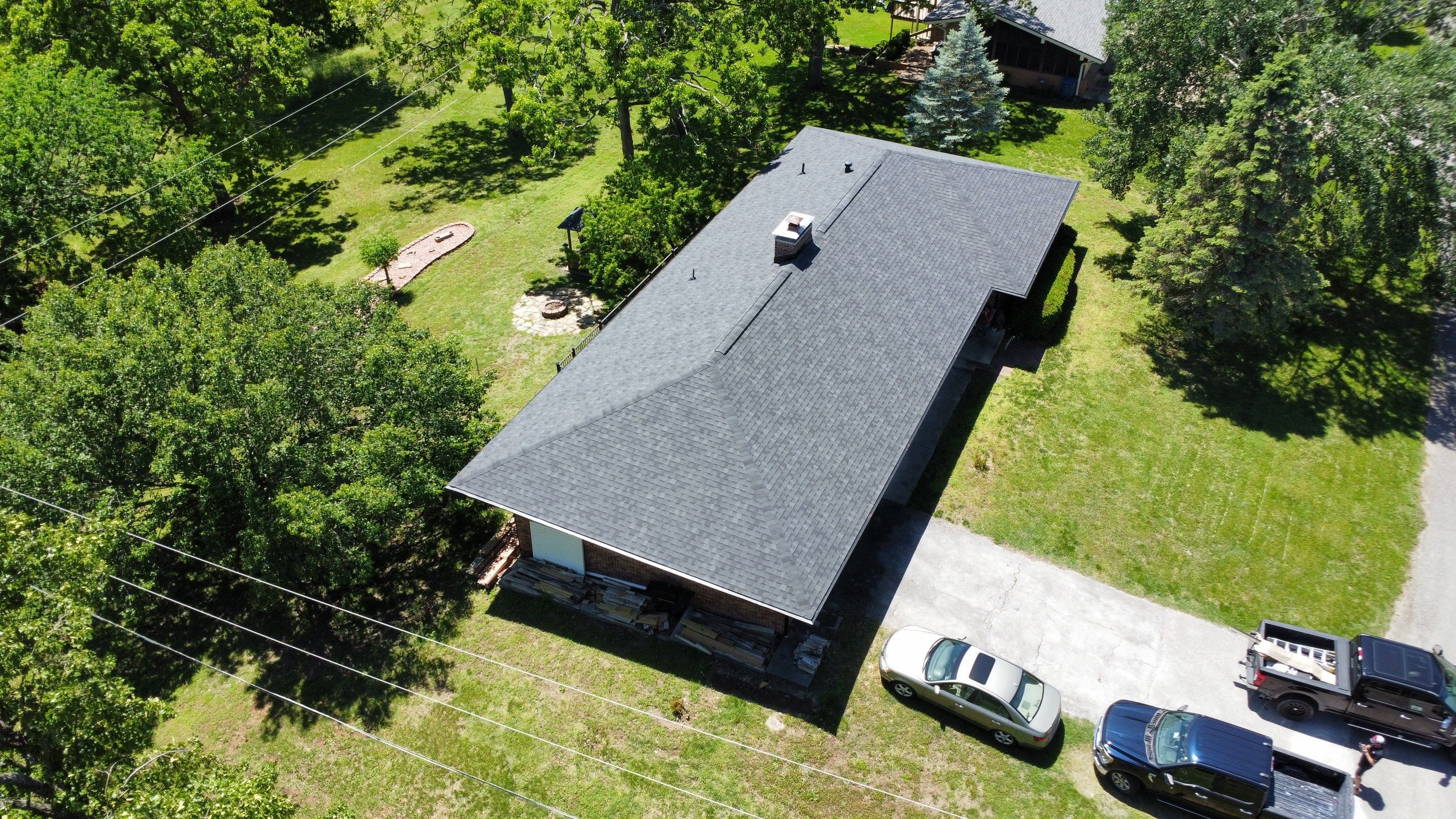 Residential Roof + Gutters & Downspouts & Gutter Guards Install  by Titan Commercial & Residential Roofing 