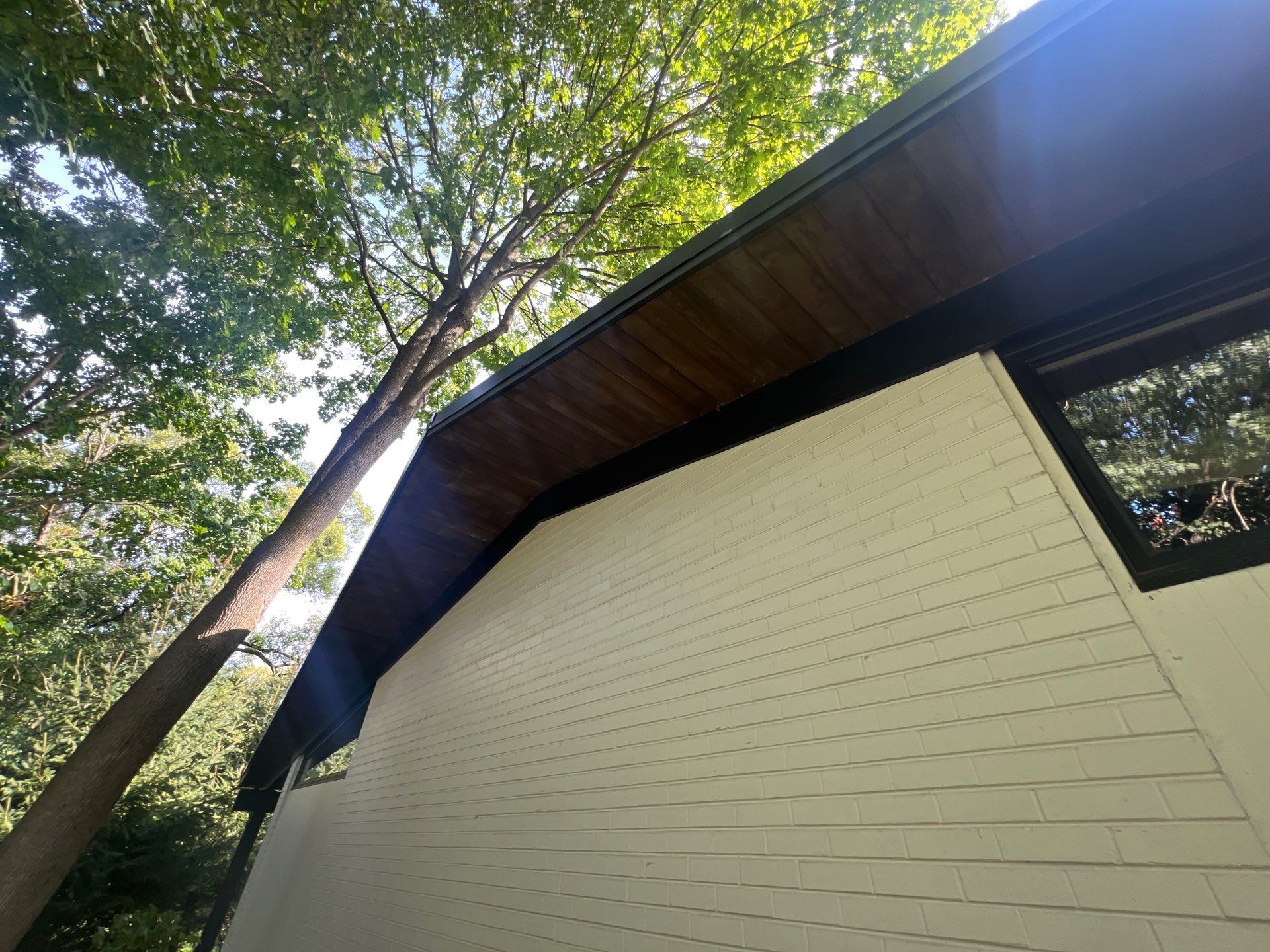 Complete Exterior House, Bluestone & Garage Floor Cleaning by Northern Power Washing LLC.