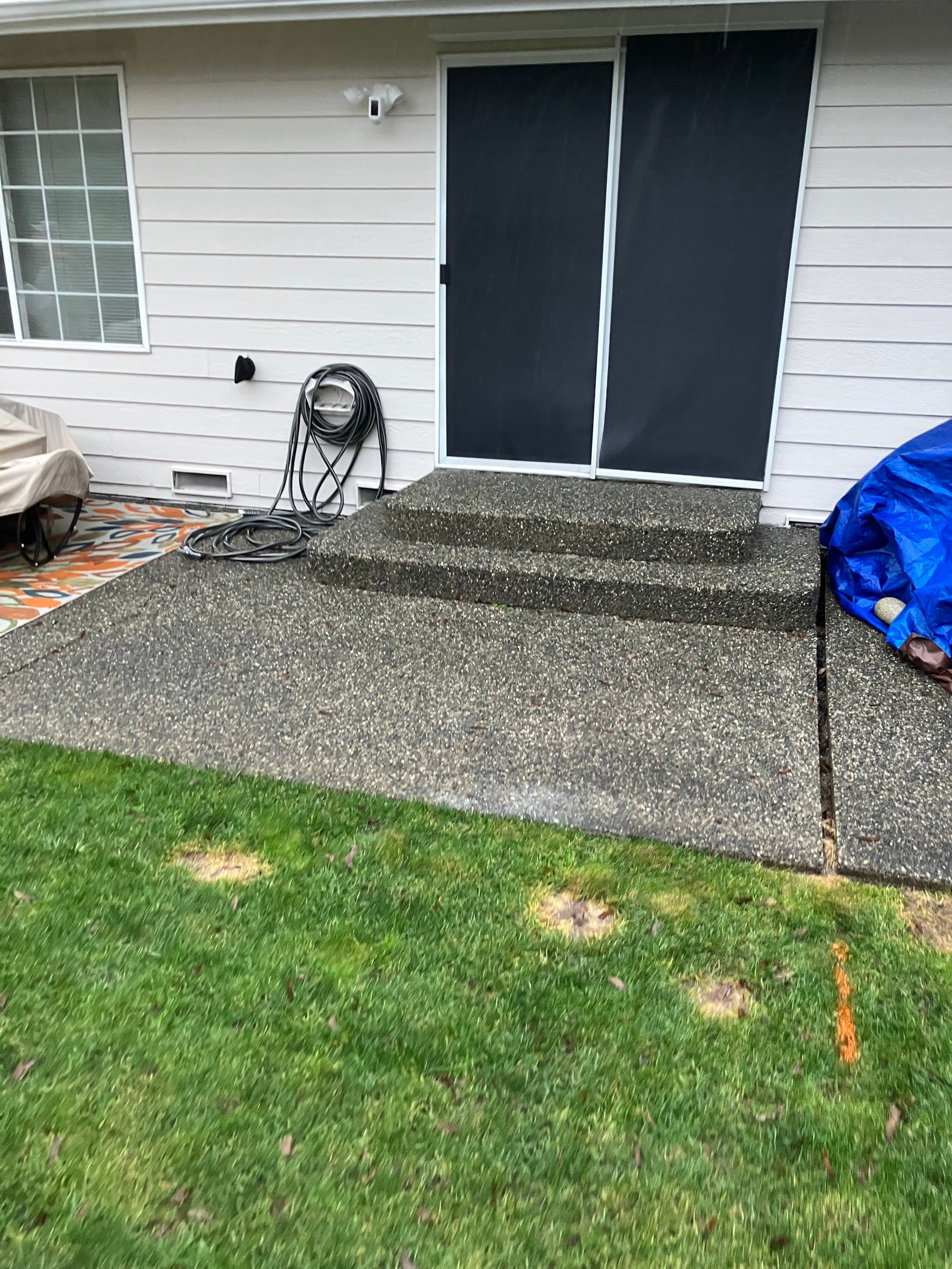 Russ | Concrete Patio  by Jireh Asphalt & Concrete Inc 