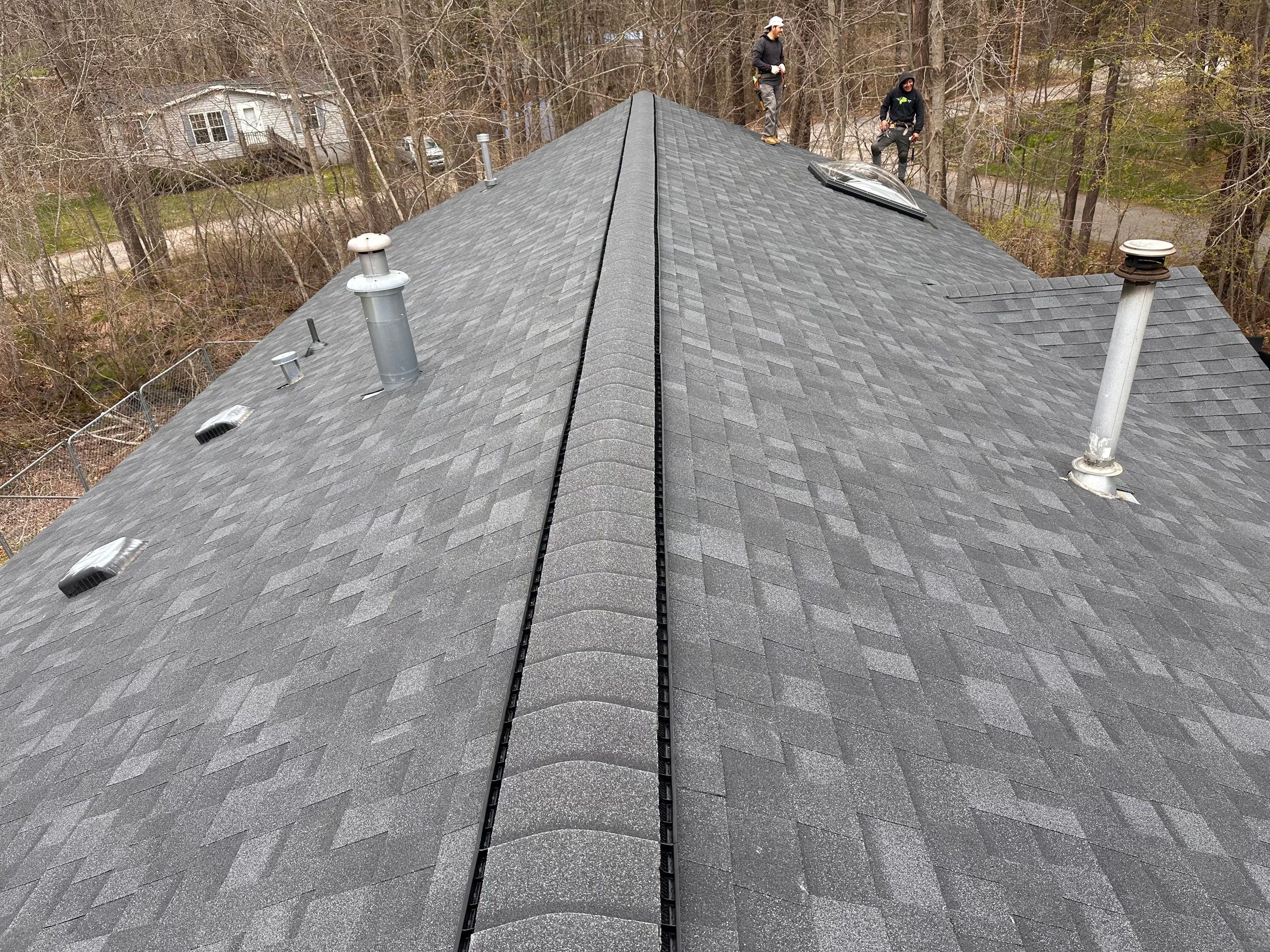 Roof Replacement & Velux Double Bubble Skylight Installation – Madbury, NH by Tall pine roofing
