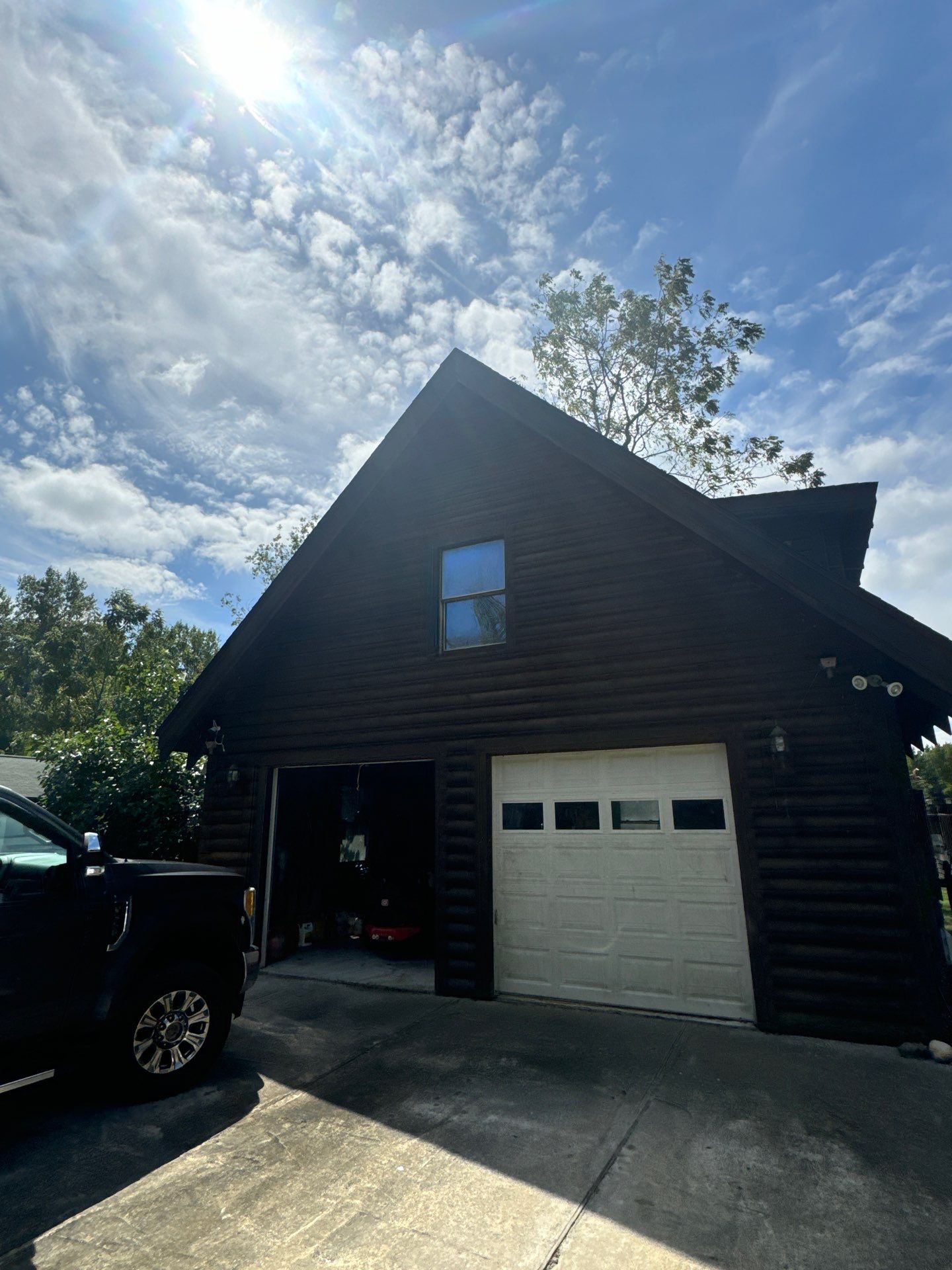 Smithfield Log Cabin by AKK Painting LLC