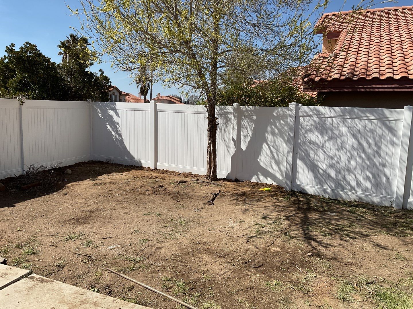 Fence installation using vinyl material by Fence Guys Inc. 
