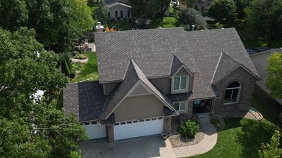 Residential Roofing Installation using IKO ArmourShake in Chalet Wood