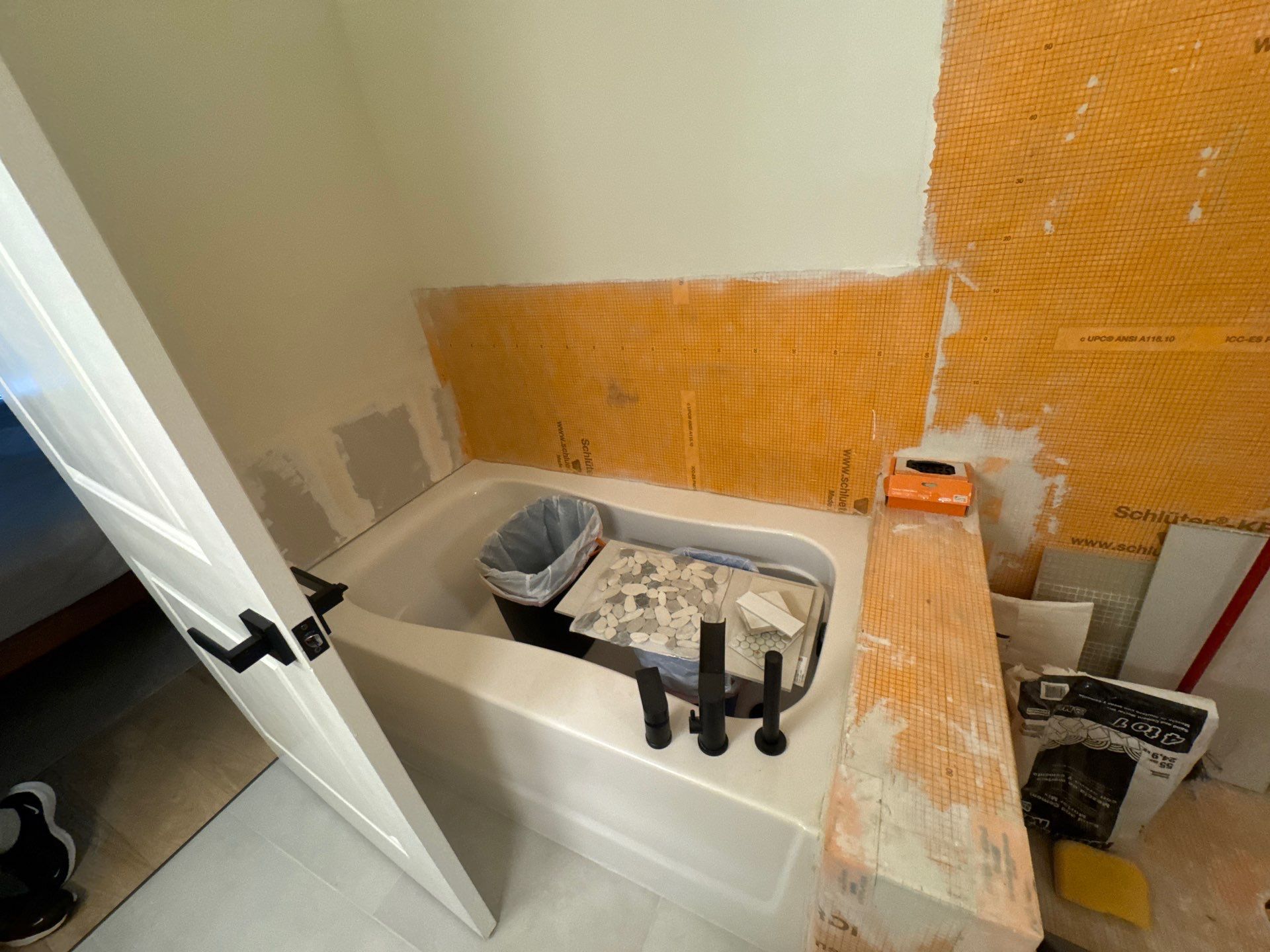Shower and tub tiling  by Prudencio