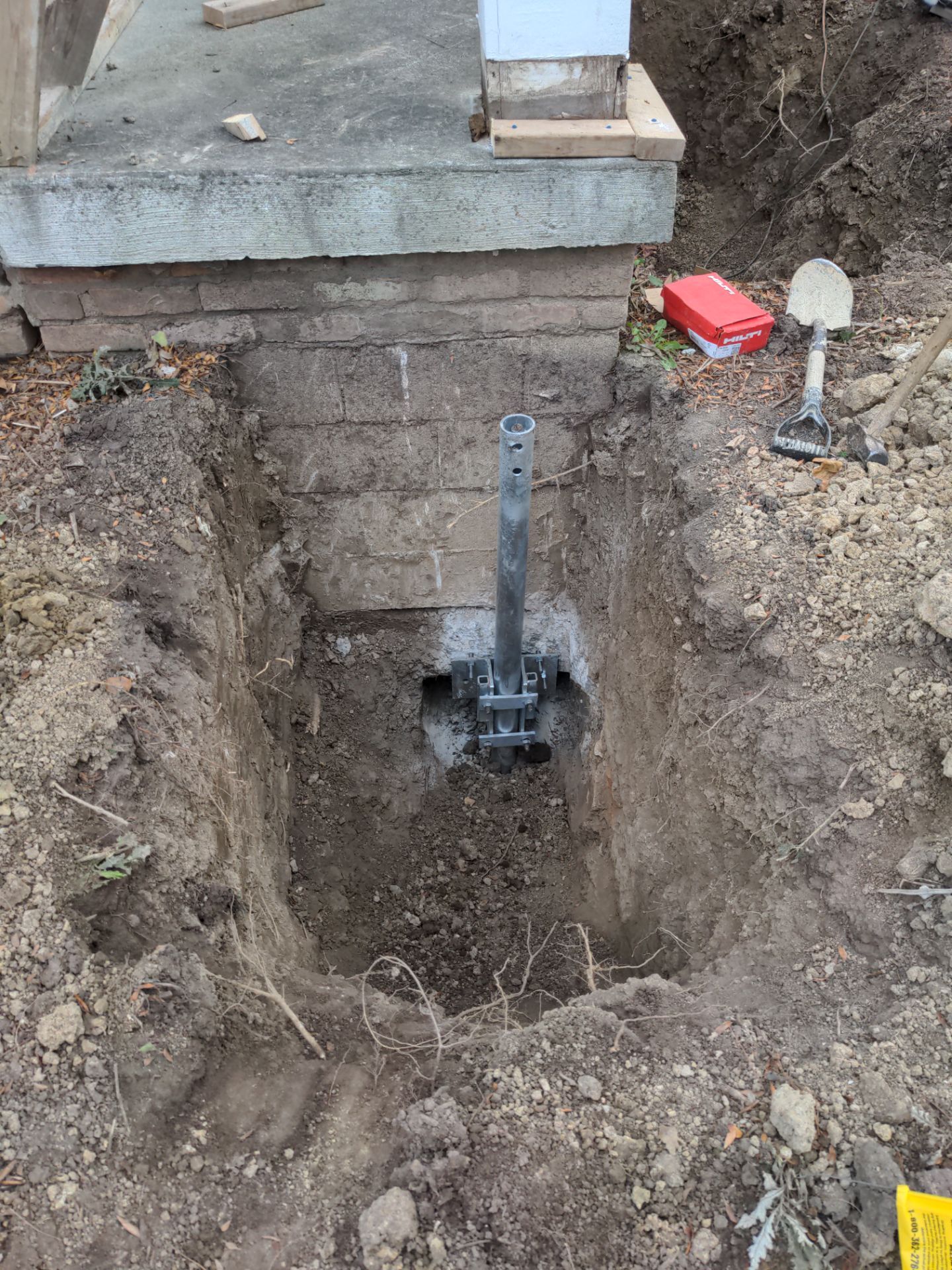 Helical Piers and Pillar Lift using Helical Foundation Footings by Toledo Basement Repair