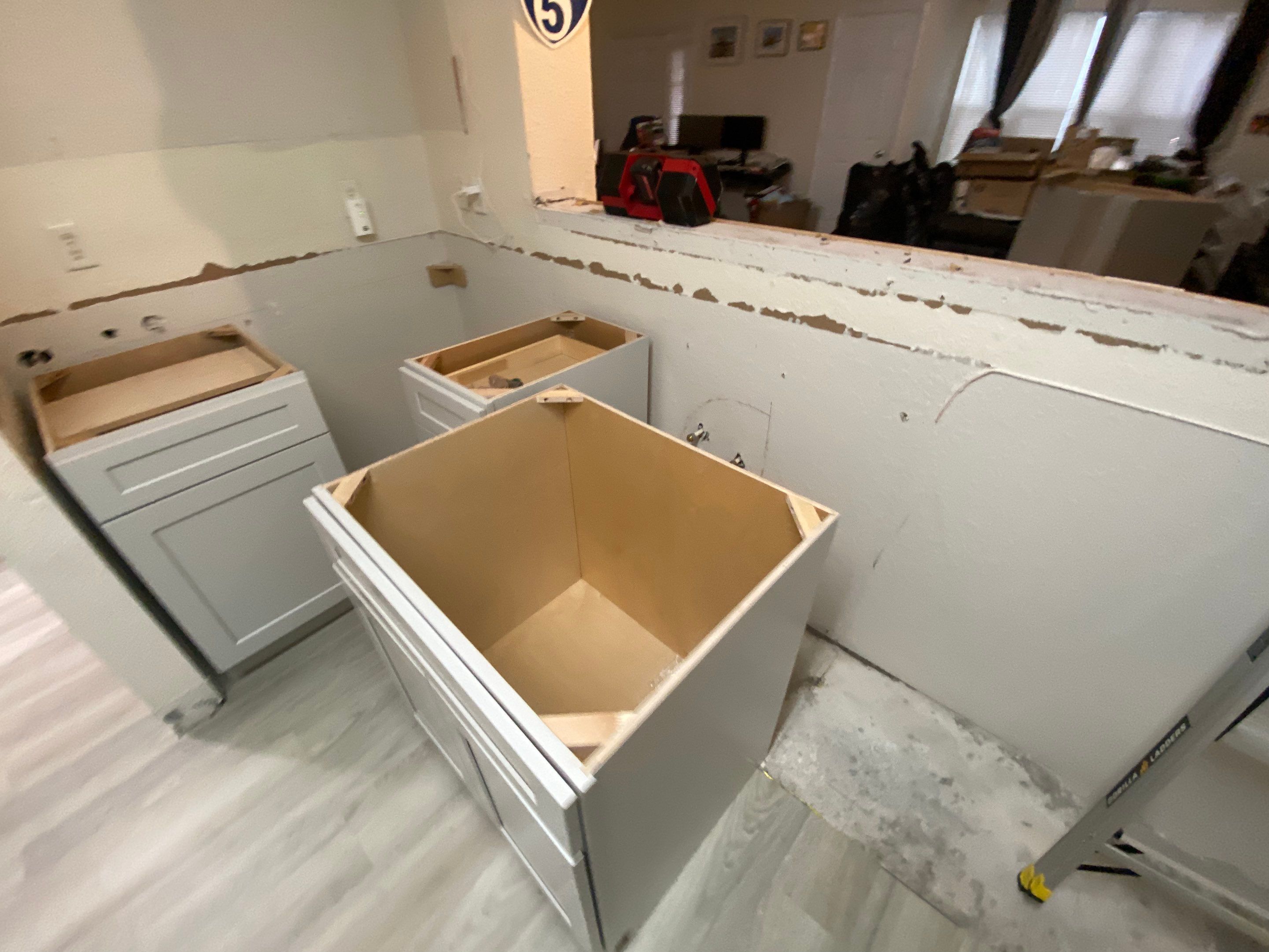 Home Remodel using LVP Flooring and Cabinets by HandyMangum