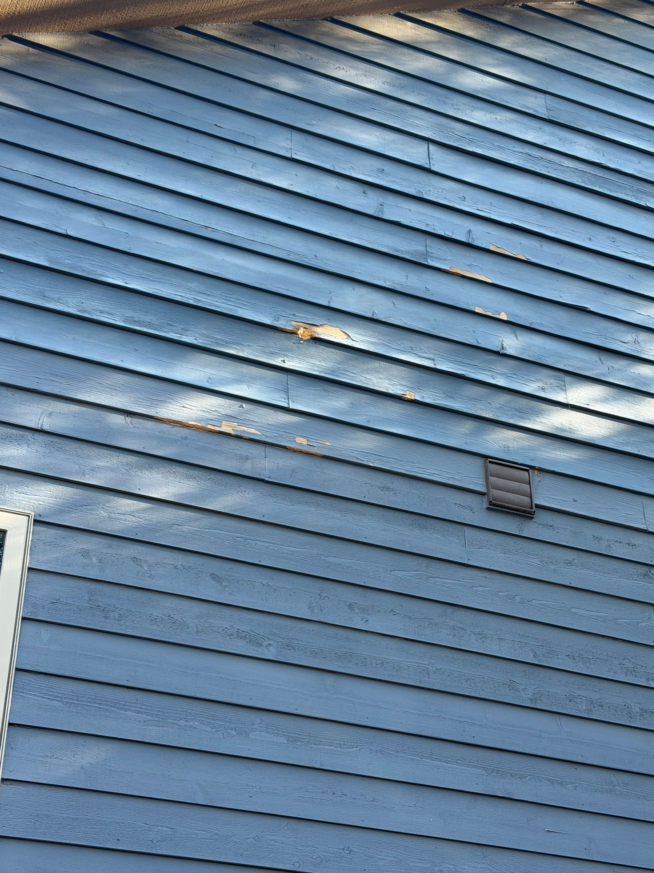 Residential Exterior Painting and Siding Refresh in Sioux Falls by Select Painting, Coatings & Garage Cabinets