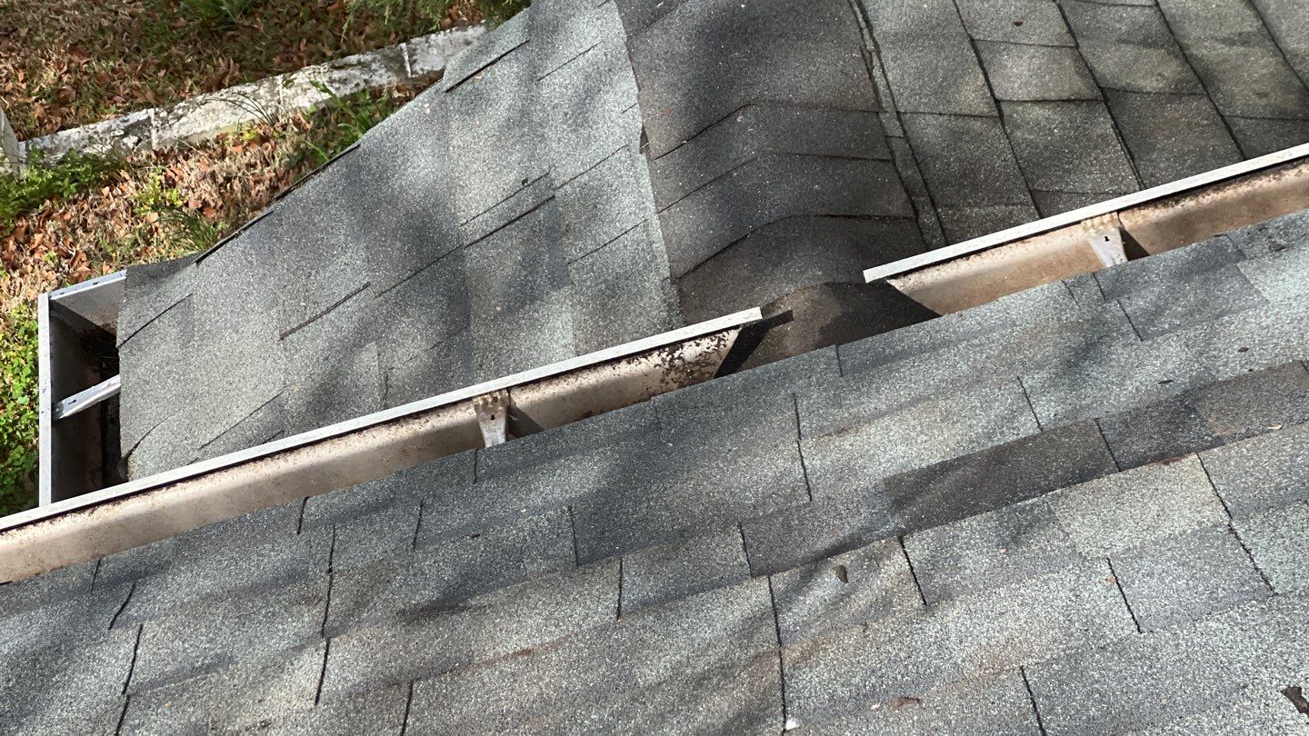 Gutter Cleaning using brown bags by Roof Bullies
