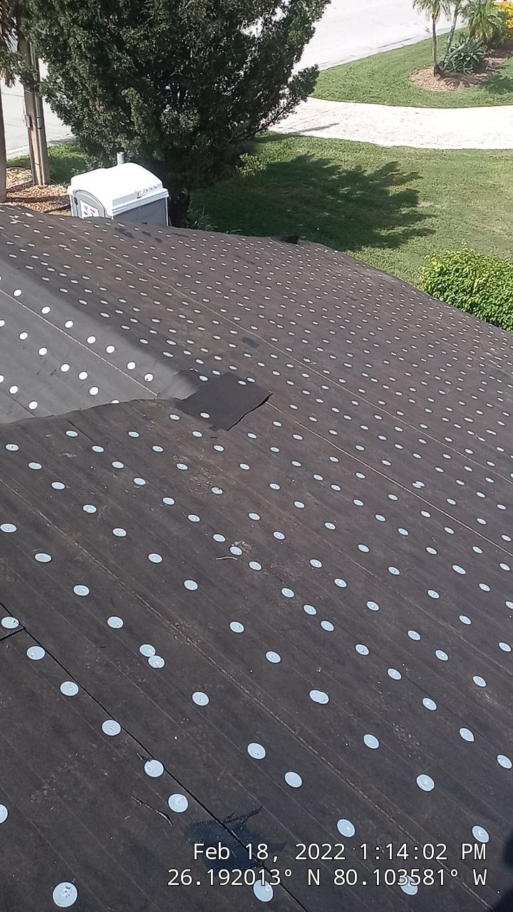 Residential Roofing Installation using 1" Nail strip metal roof by BLUES BROTHERS ROOFING