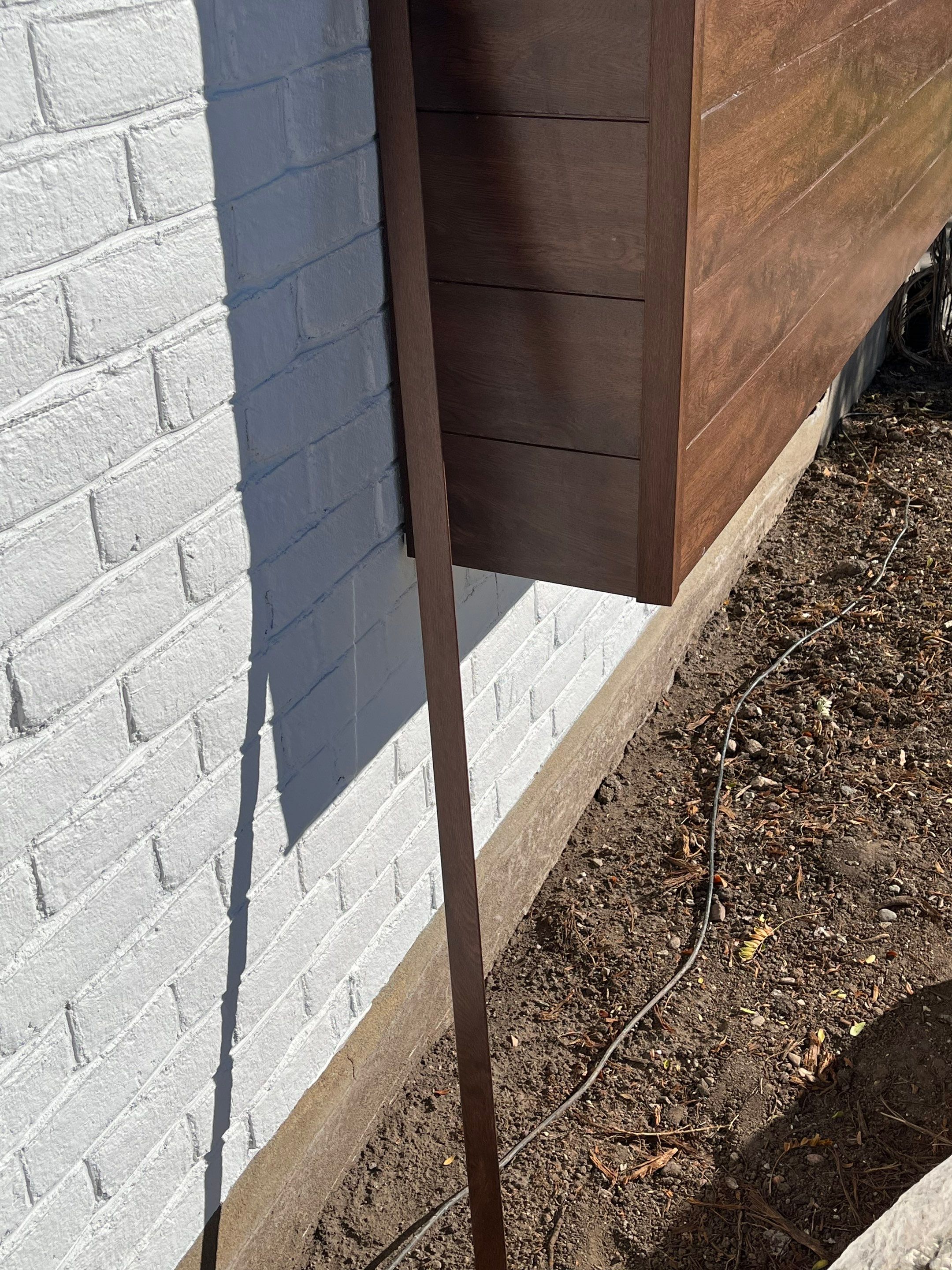 Centerville | High-End Stucco Conversion Accent | Walnut Cedar & Primed B&B by Ideal Siding Utah