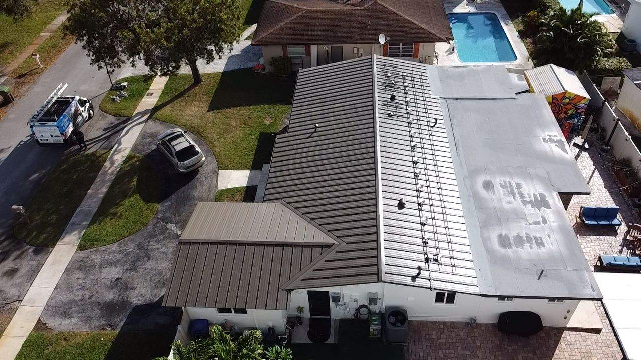 Residential Roofing Installation using Metal Roof  by City Roofing Inc