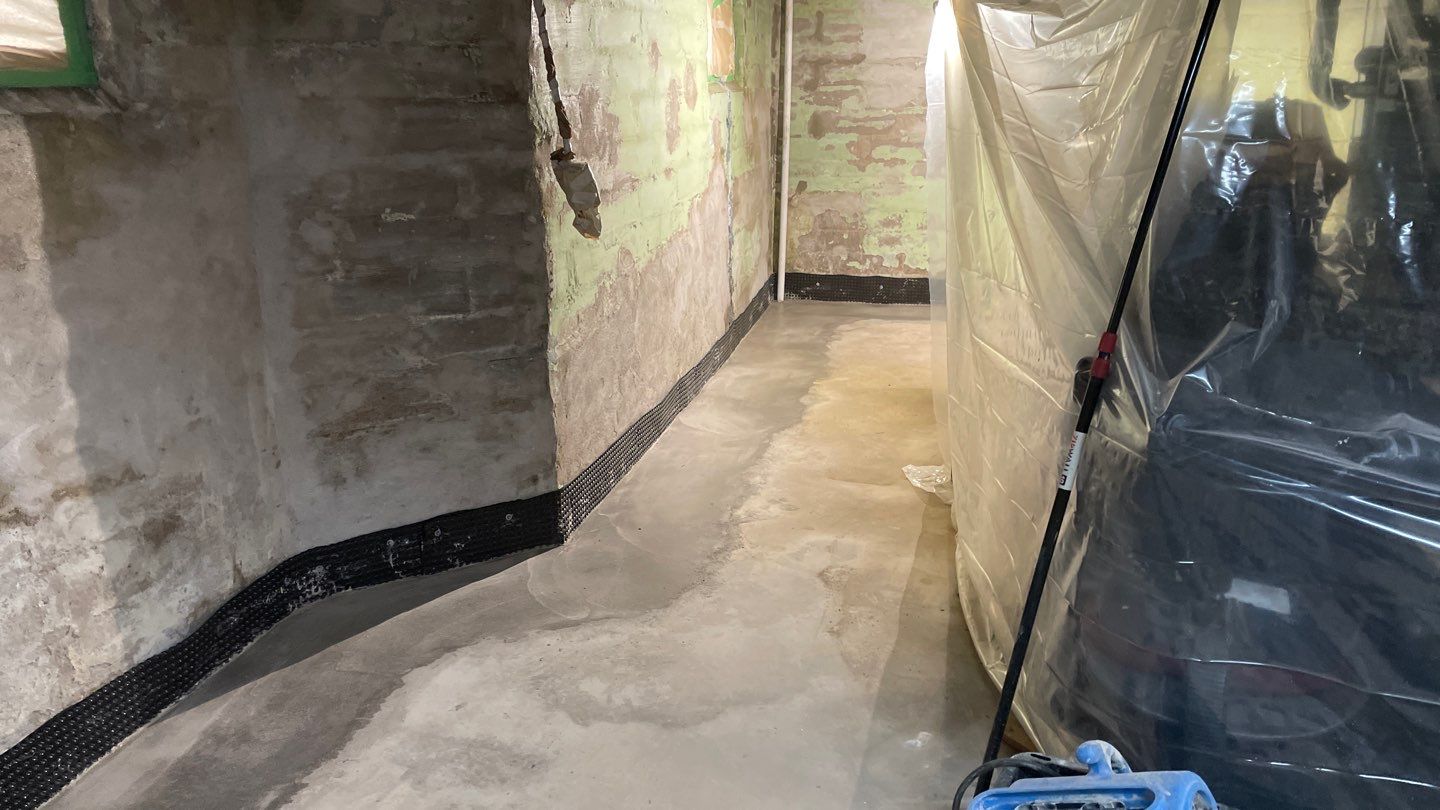 Interior Drain Tile & Foundation Crack Repair in Northeast Minneapolis by Waterproofing Northeast