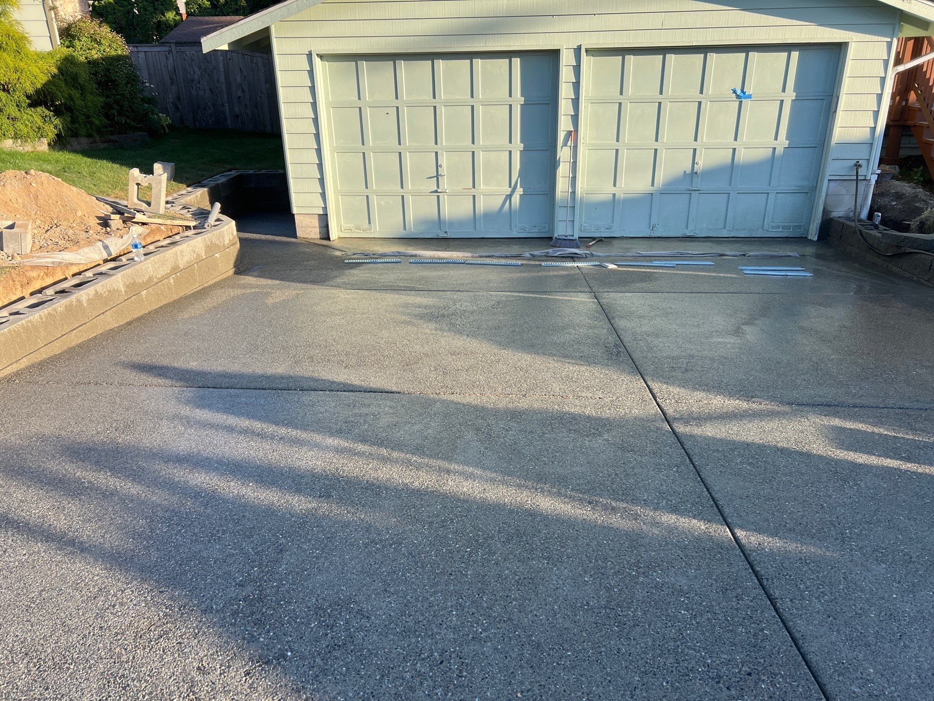 Concrete Patio & Driveway Renovation with Retaining Wall | Seattle  by Jireh Asphalt & Concrete Inc 