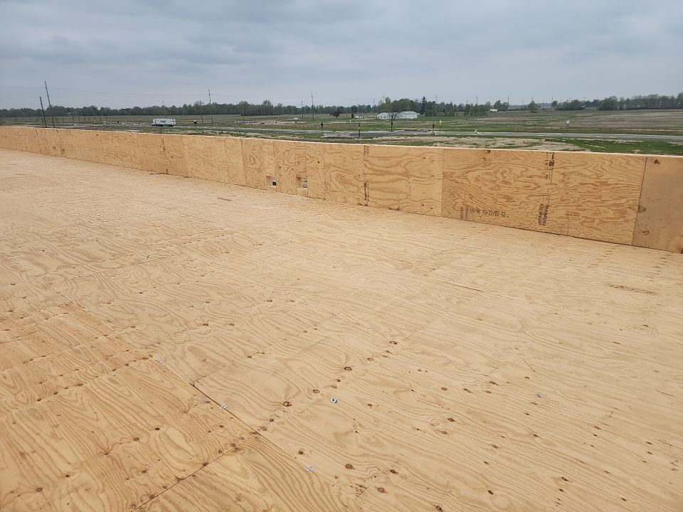 Commercial Roofing Installation using 60 mil rubber roof  by Nitro Roofing and Construction