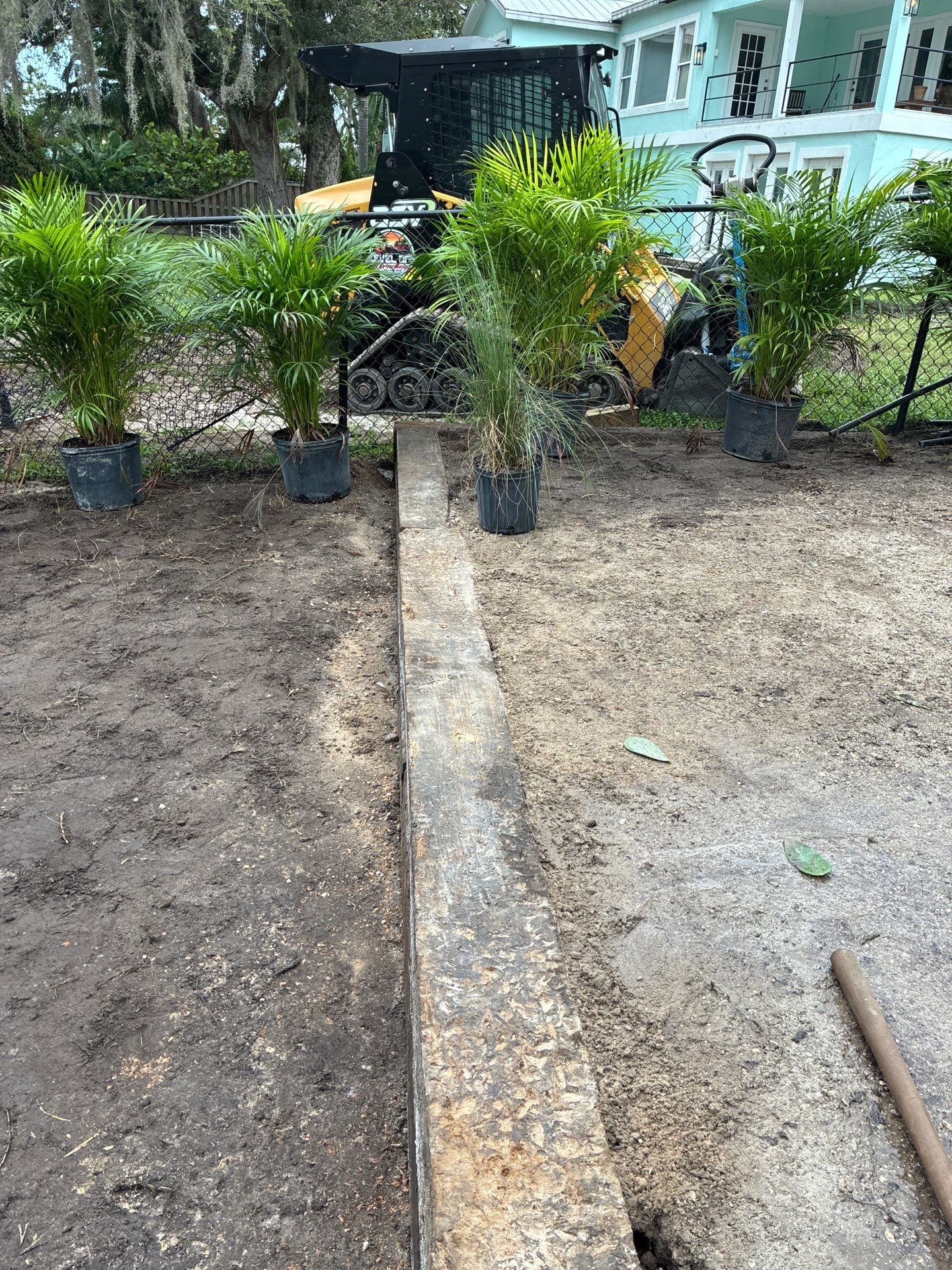 Grading back yard oasis by Level One Grading 