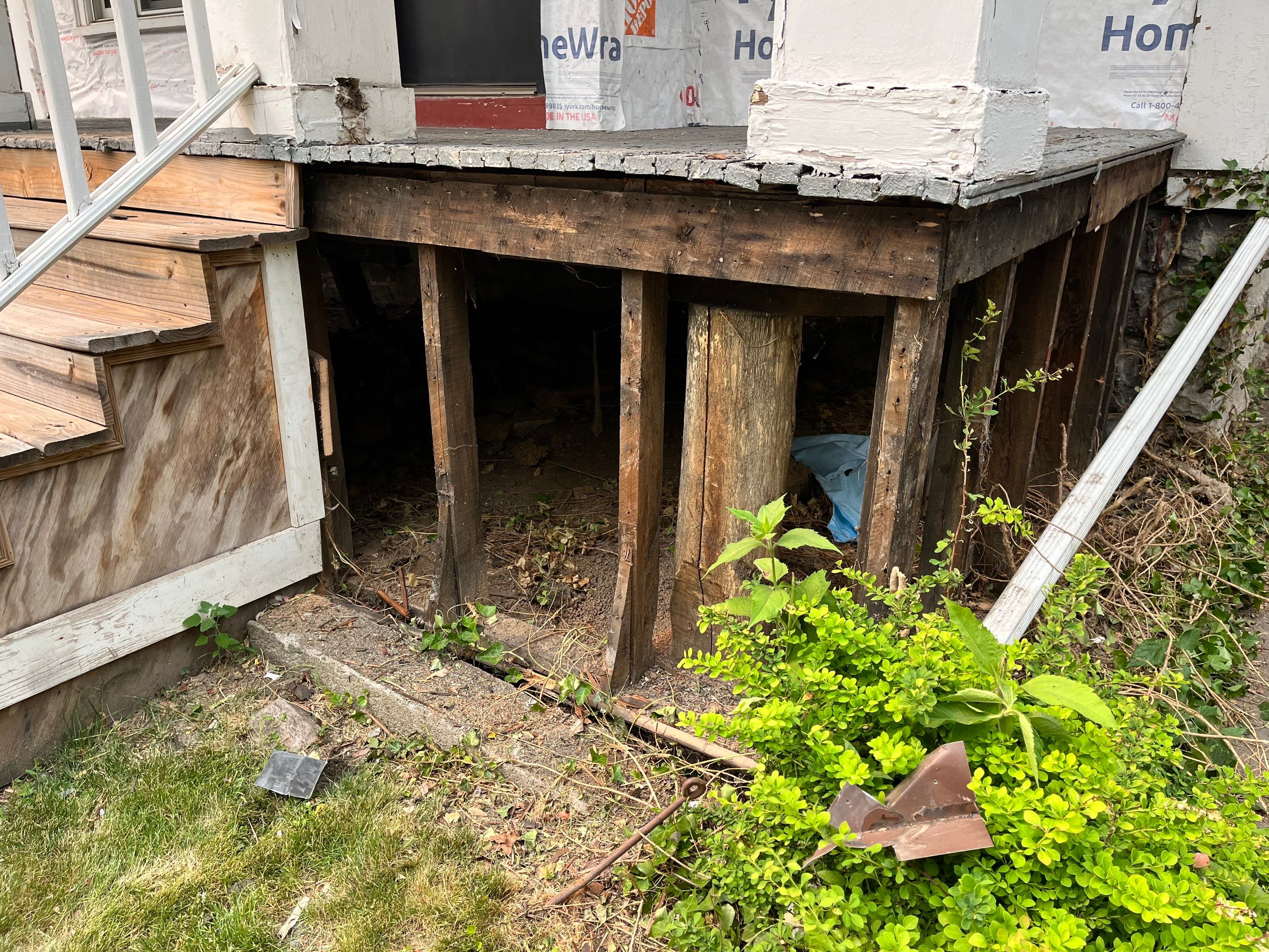 Exterior Renovations- Siding, Stamped Concrete, Porch, and Railings by Ivy Lea Construction
