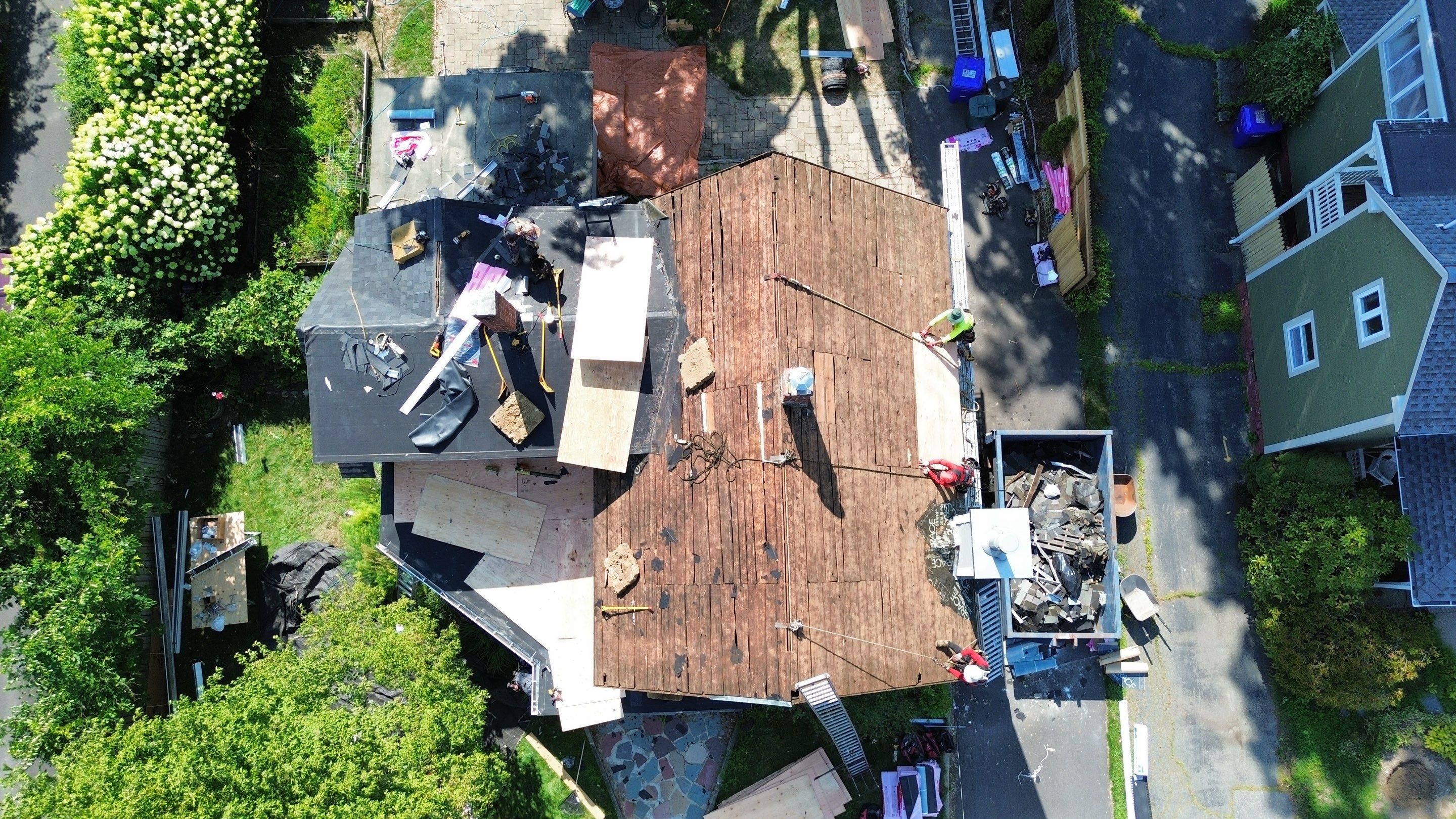 Full Roof Replacement + Custom Gutter Install | Onyx Black Finish by Mighty Dog Roofing of Greater Middlesex County