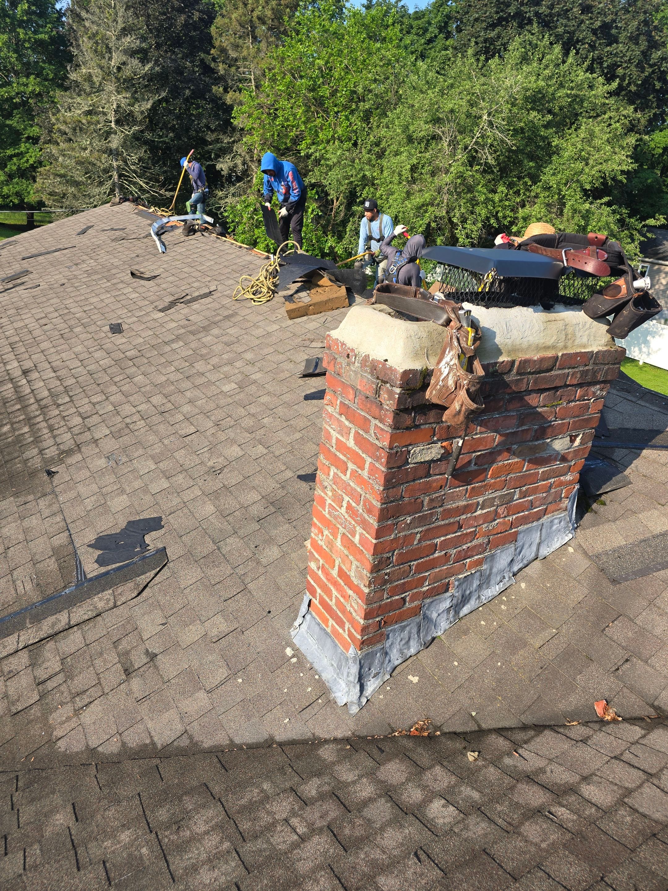 Full Roof Replacement & Chimney Repair – Onyx Black, MA by Mighty Dog Roofing of Greater Middlesex County