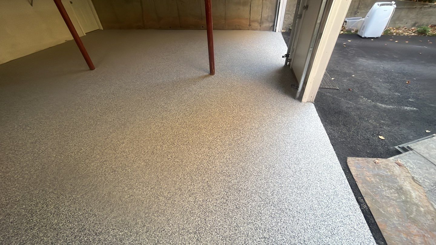 Garage in Londonderry, NH 03053 by Symphony Concrete Coatings
