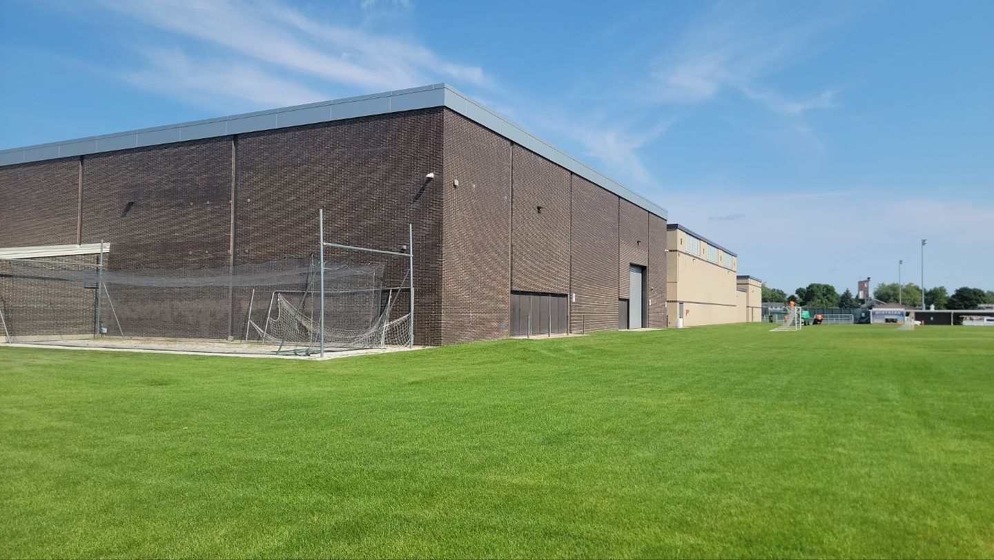 commercial pressure washing using Algaecide, soft wash soap by Northern Power Washing LLC.