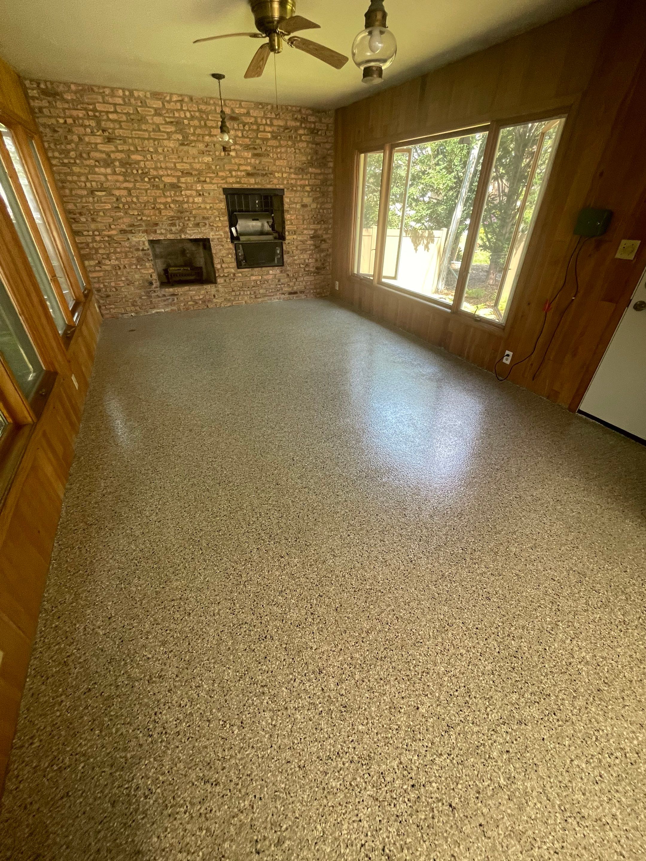 Sioux Falls Garage and Sunroom Concrete Coating with Coyote Flake by Select Painting, Coatings & Garage Cabinets
