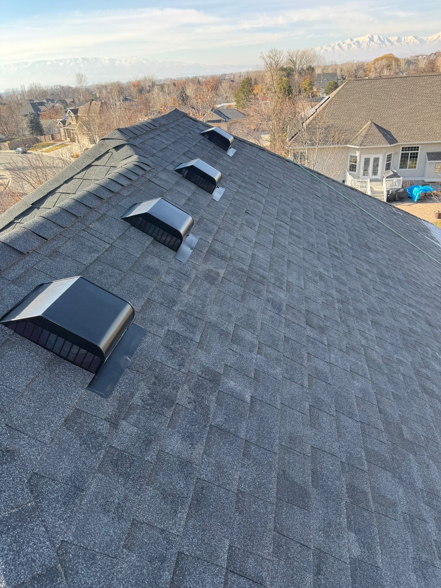 Charcoal Gray Shingles by Reimagine Roofing