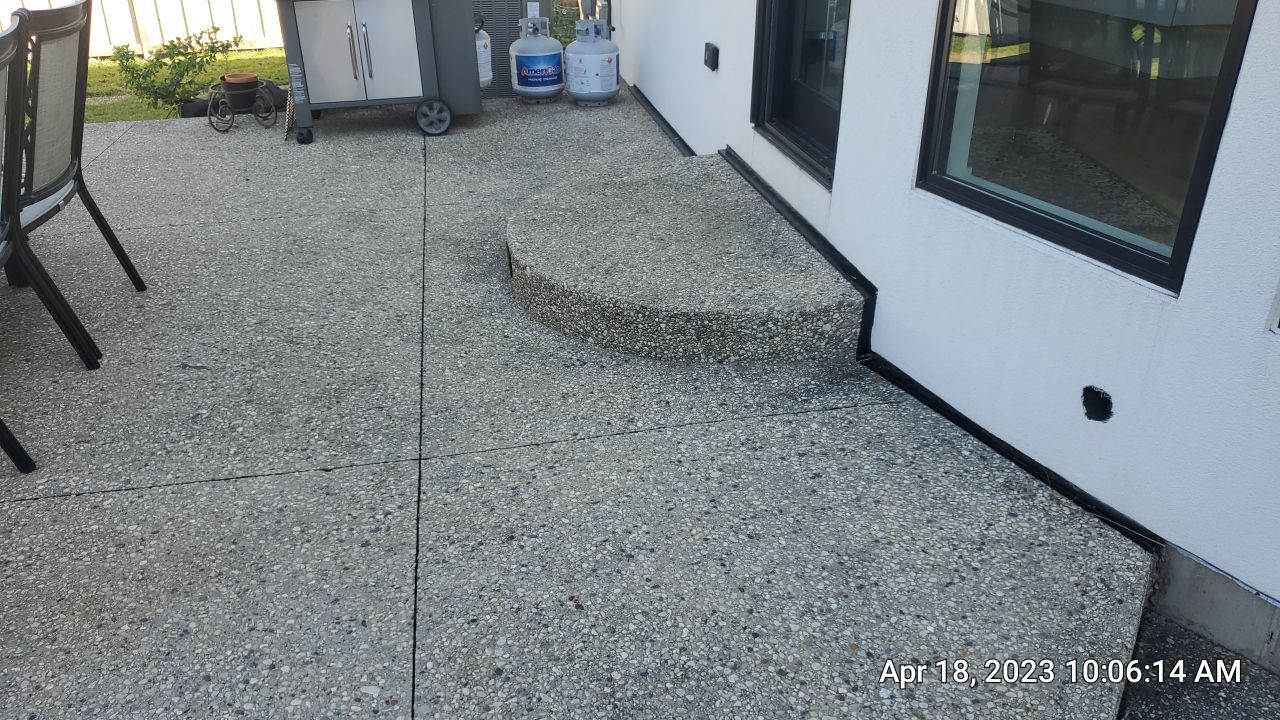 Aggregate concrete cleaning and sealing using Surebond SB-9000 by Northern Power Washing LLC.