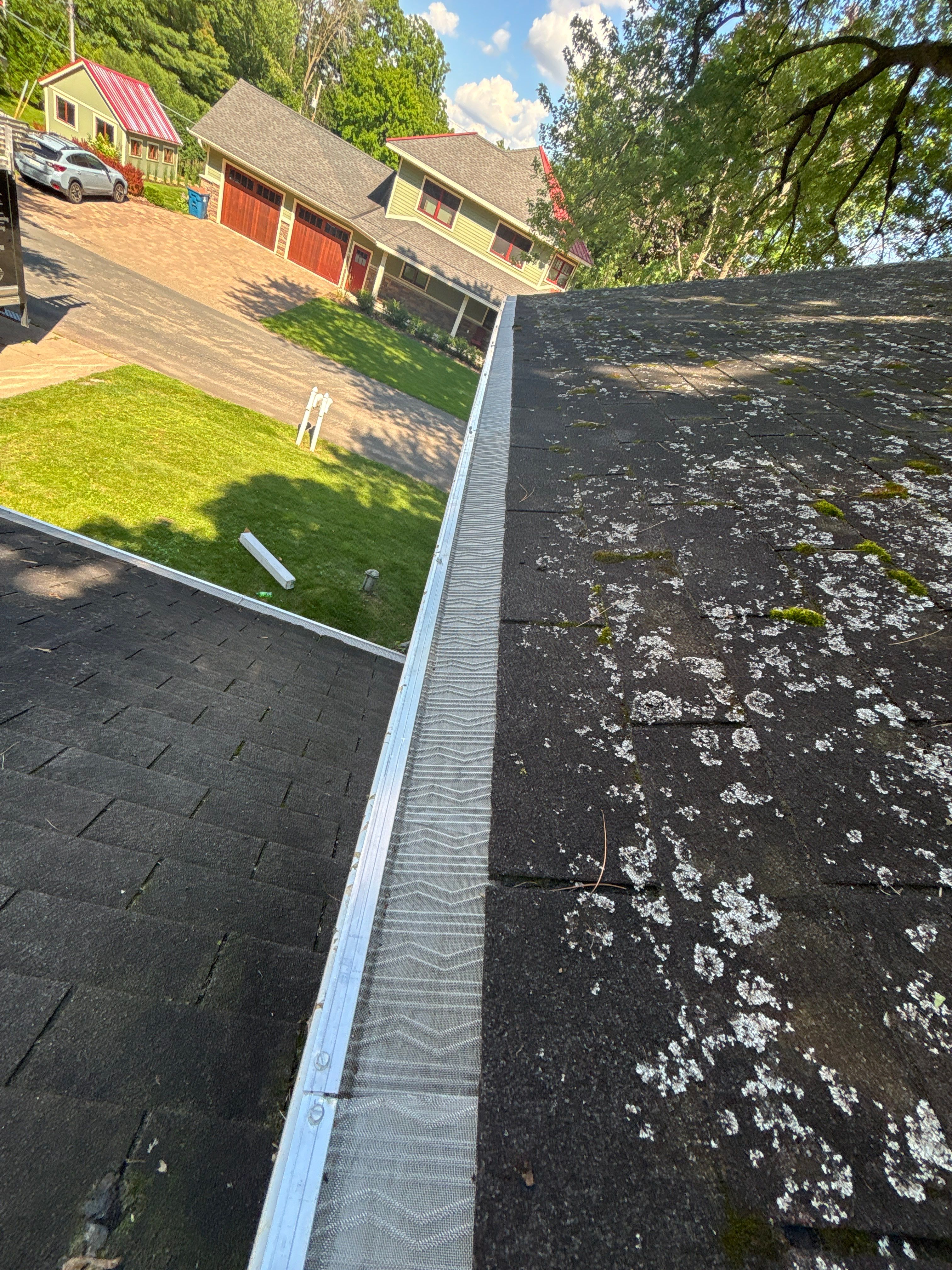 Gutter Cleaning + Leaf Blaster Pro Installation by Next Level Seamless Gutters / Exteriors Inc.