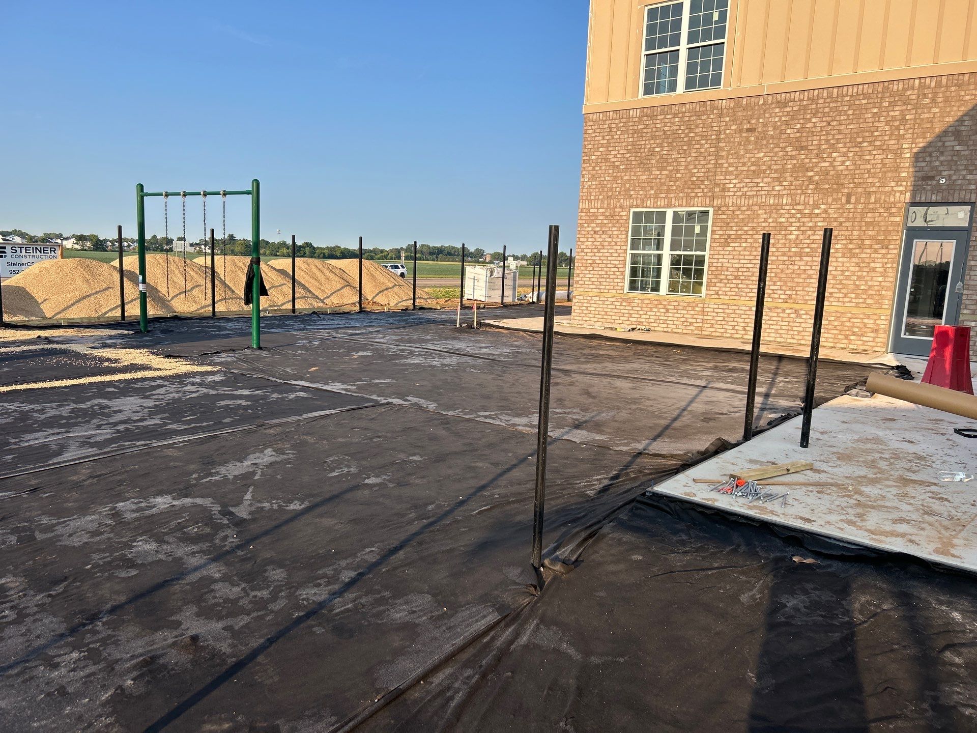 Lake Elmo Playground Artificial Turf Installation by Southwest Greens Midwest