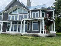 Siding Installation using JH Cedar Mill Plank by ExteriorPros