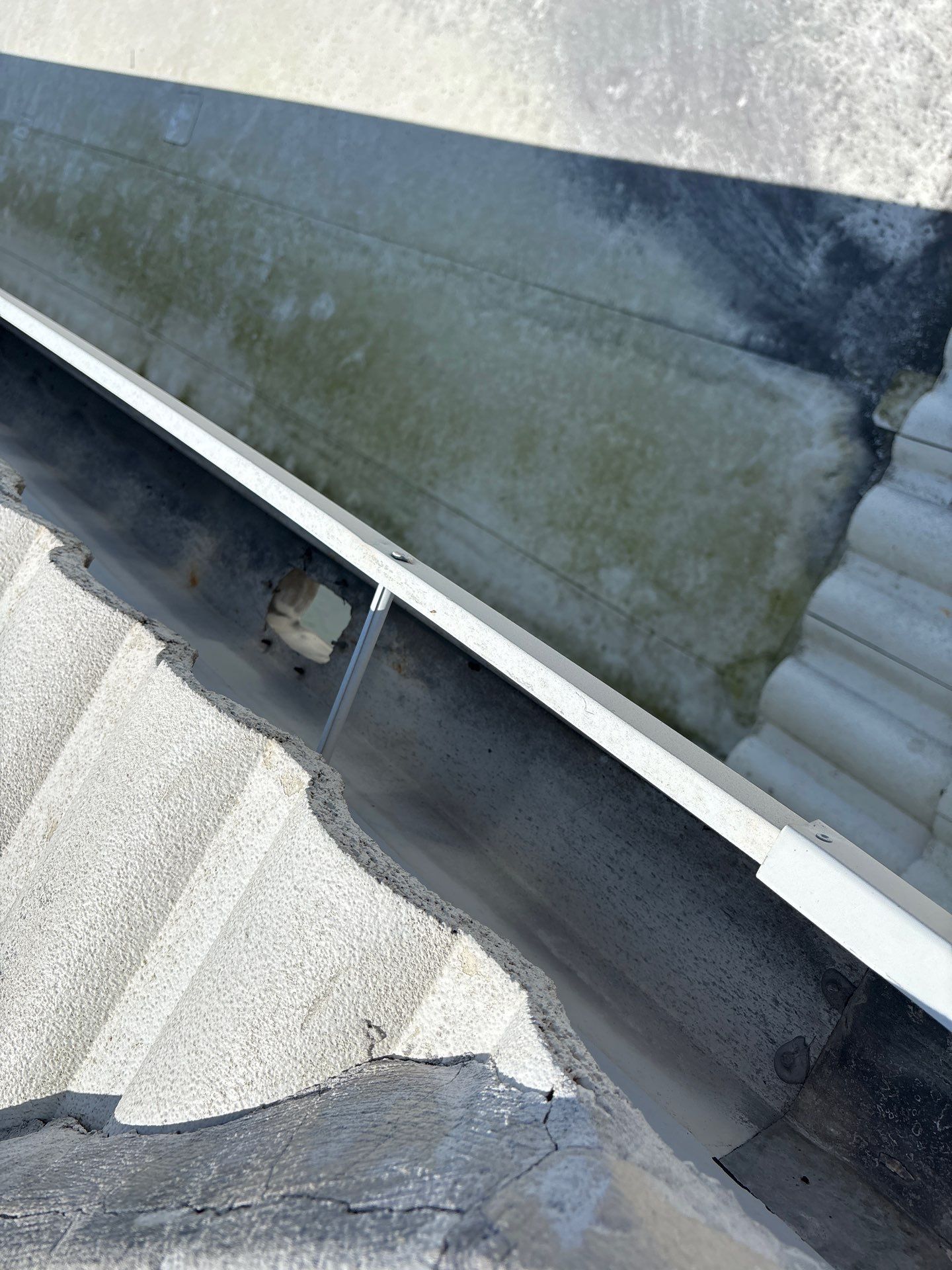 Splash Guard Gutters for Coastal Homes in Longboat Key FL by Gutter Professors