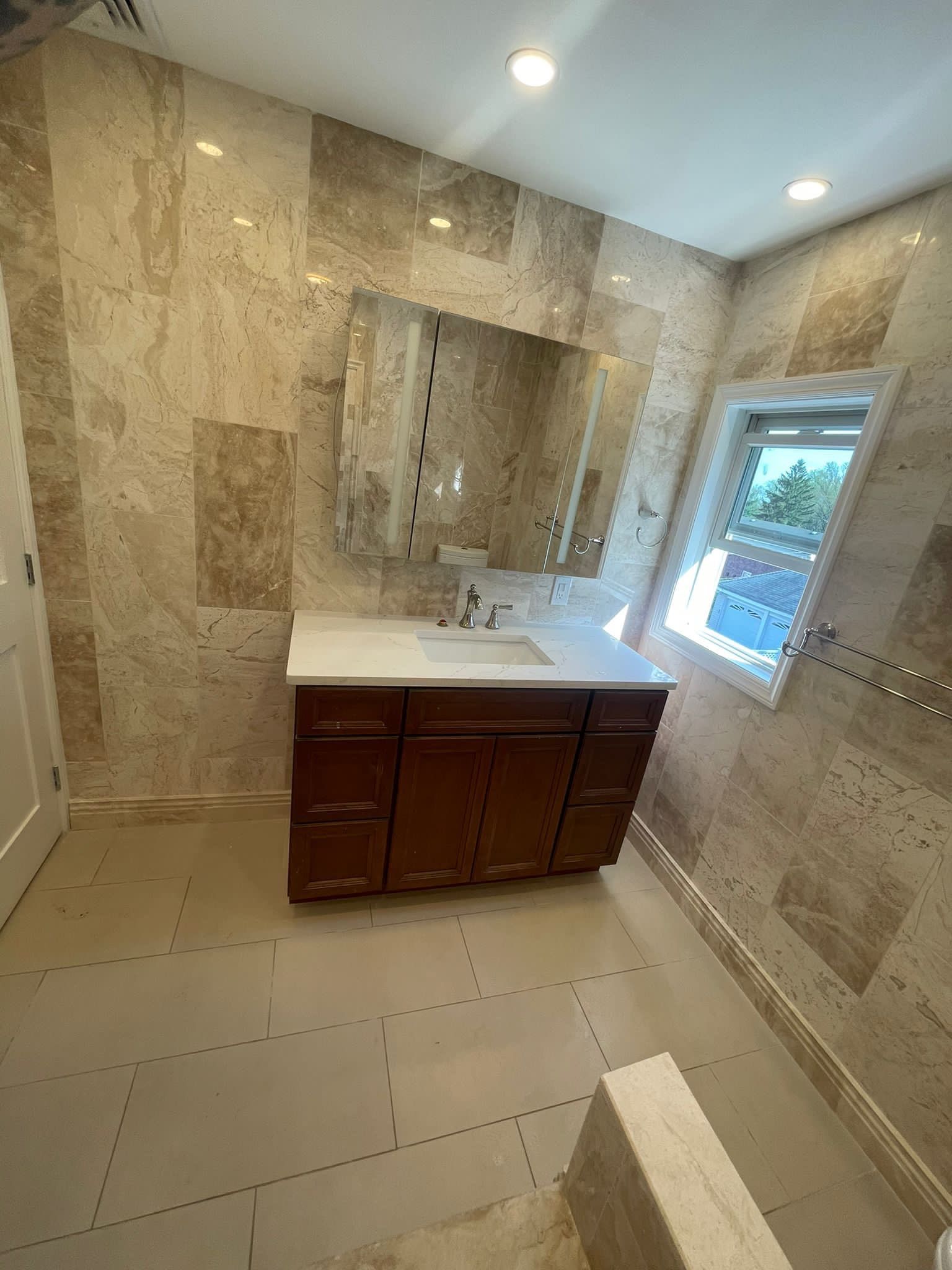 Bathroom Remodel using Tile by Home Concepts Construction