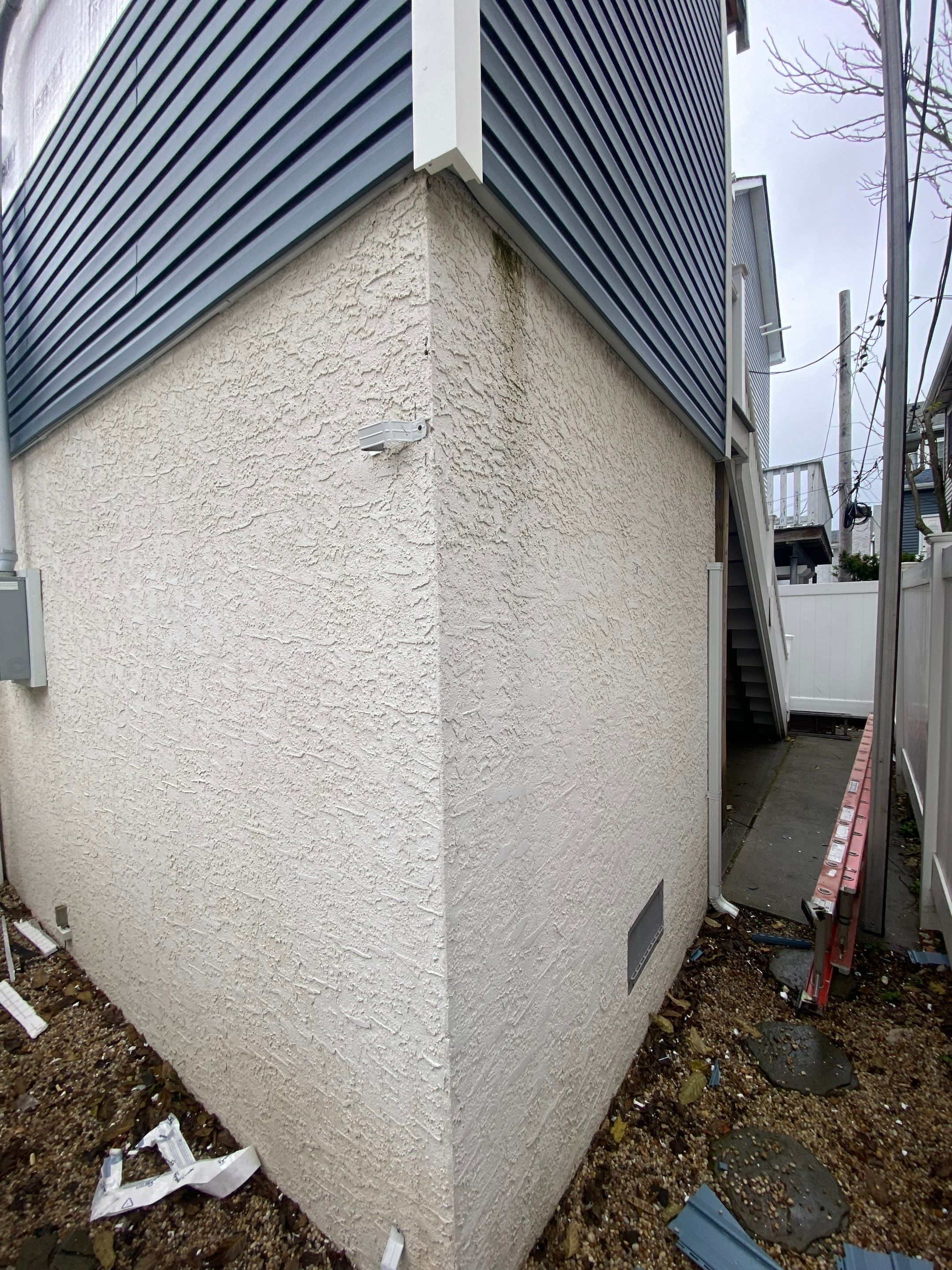 House lift in the westend of Long Beach. by Above All Gutters