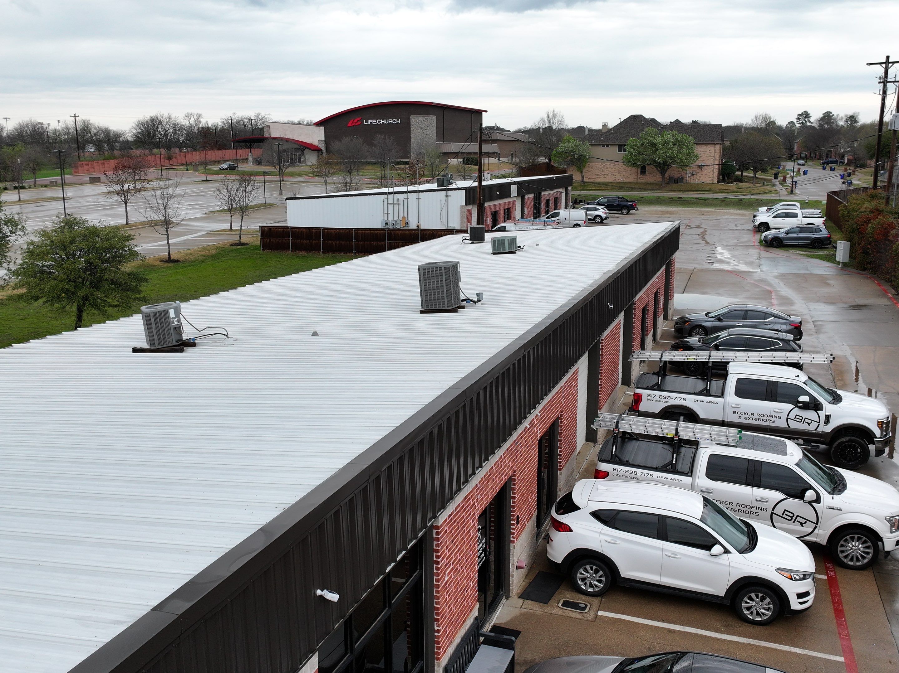 Commercial Roofing Installation using Double lock Mechanical Standing Seam Metal by Becker Roofing and Exteriors