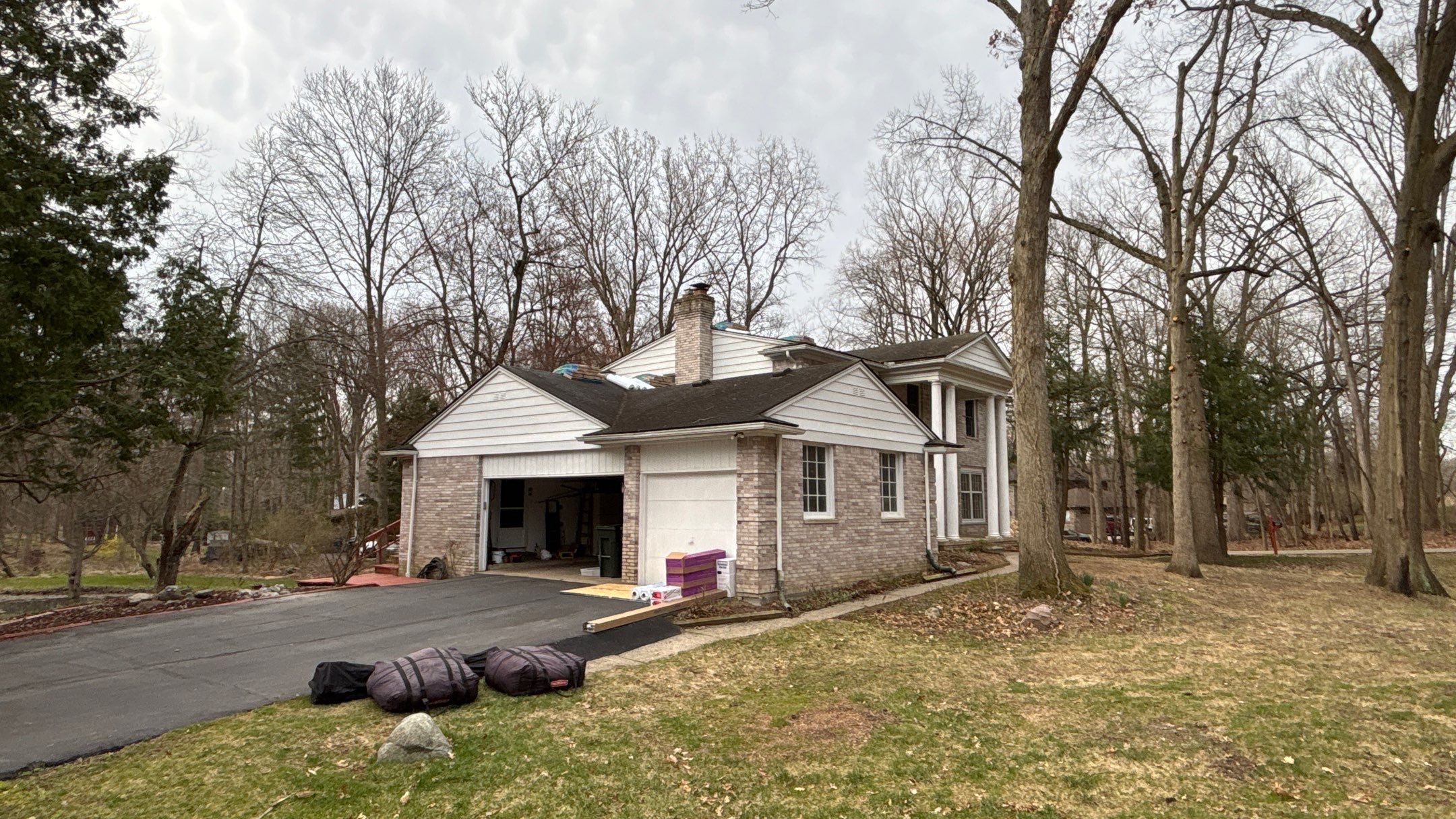 Roof Replacement using CertainTeed Landmark Moire Black by 180 Contractors